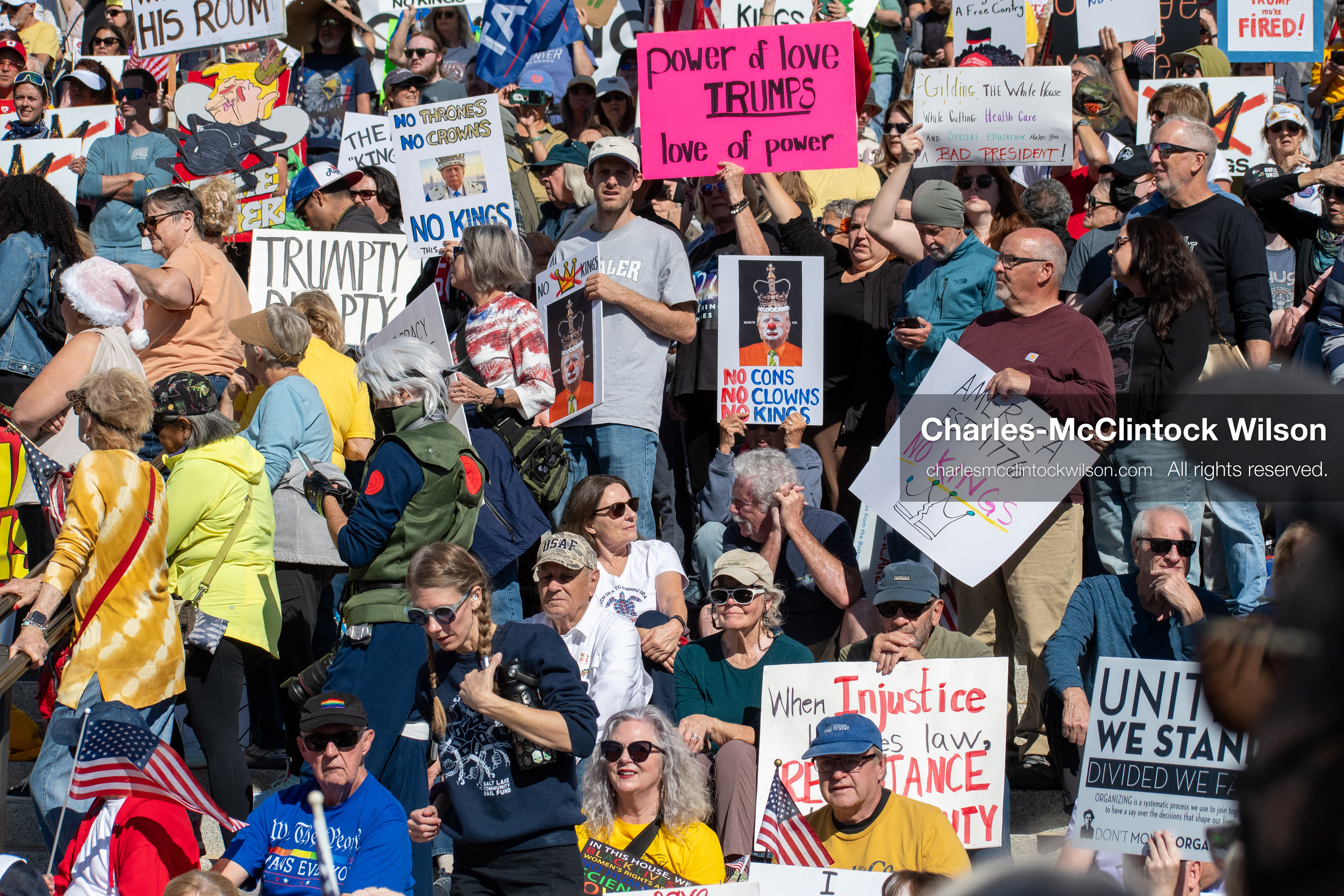 October 18, 2025, Salt Lake City, Utah, USA: Demonstrators participate in a "No Kings" protest held at the Utah State Capitol. Participants hold signs and flags during the public gathering.