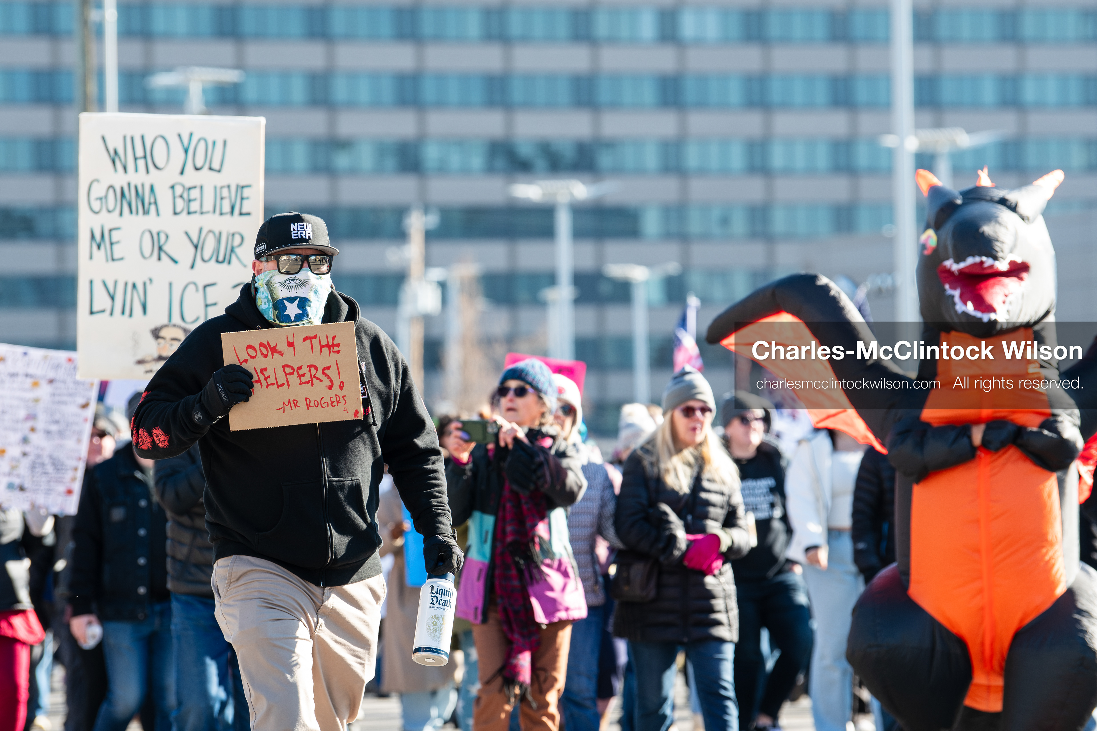Salt Lake City, Utah, January 10, 2026: A group of demonstrators marches through downtown Salt Lake City during the ICE Out for Good protest, which began at Washington Square Park, with participants carrying signs and personal items as they walk together. (Credit Image: © Charles‑McClintock Wilson/ZUMA Press Wire)
