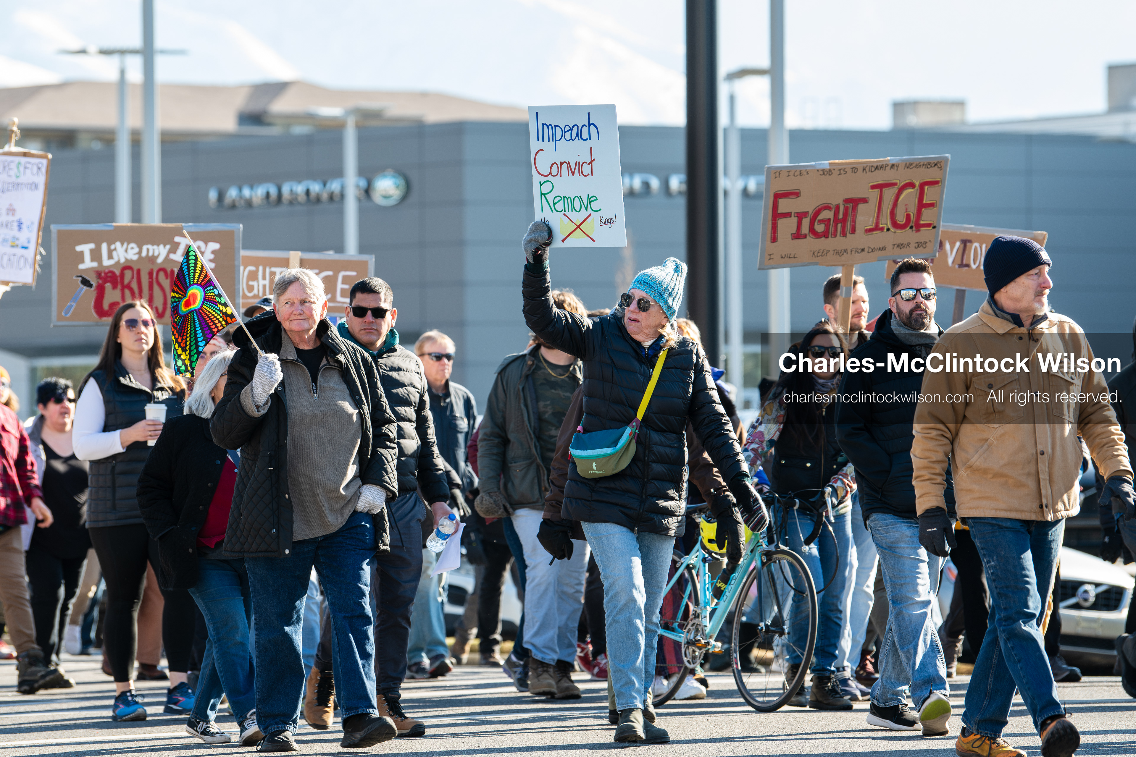 Salt Lake City, Utah, January 10, 2026: A group of demonstrators marches through downtown Salt Lake City during the ICE Out for Good protest, which began at Washington Square Park, with participants carrying signs and personal items as they walk together. (Credit Image: © Charles‑McClintock Wilson/ZUMA Press Wire)