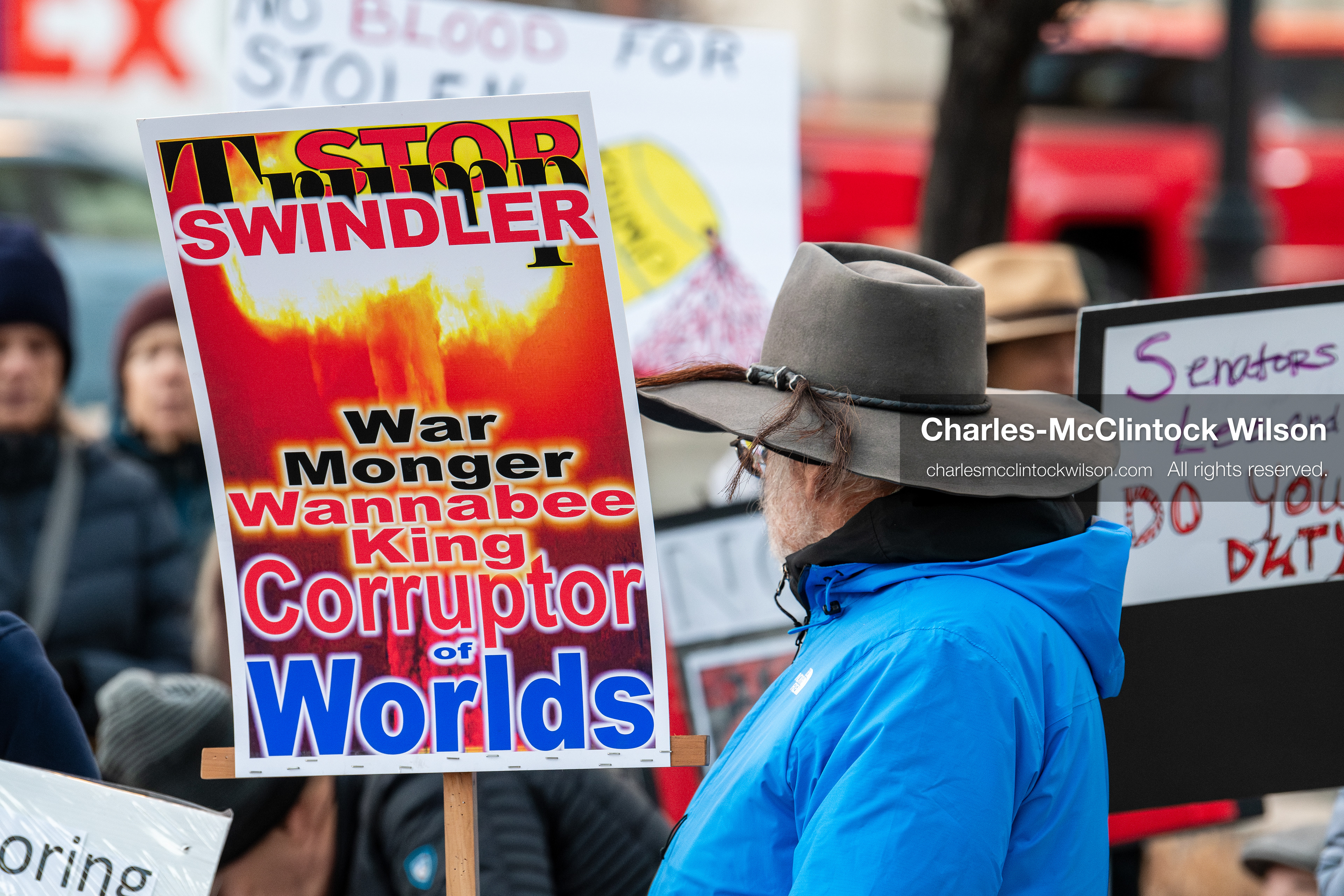 January 5, 2026, Salt Lake City, Utah, USA: A demonstrator holds a sign during a protest outside the Wallace Federal Building in Salt Lake City, Utah. The rally, organized by Salt Lake Indivisible, called for congressional limits on presidential war powers following recent US military actions in Venezuela involving the government of Nicolas Maduro. (Credit Image: (c) Charles‑McClintock Wilson/ZUMA Press Wire)