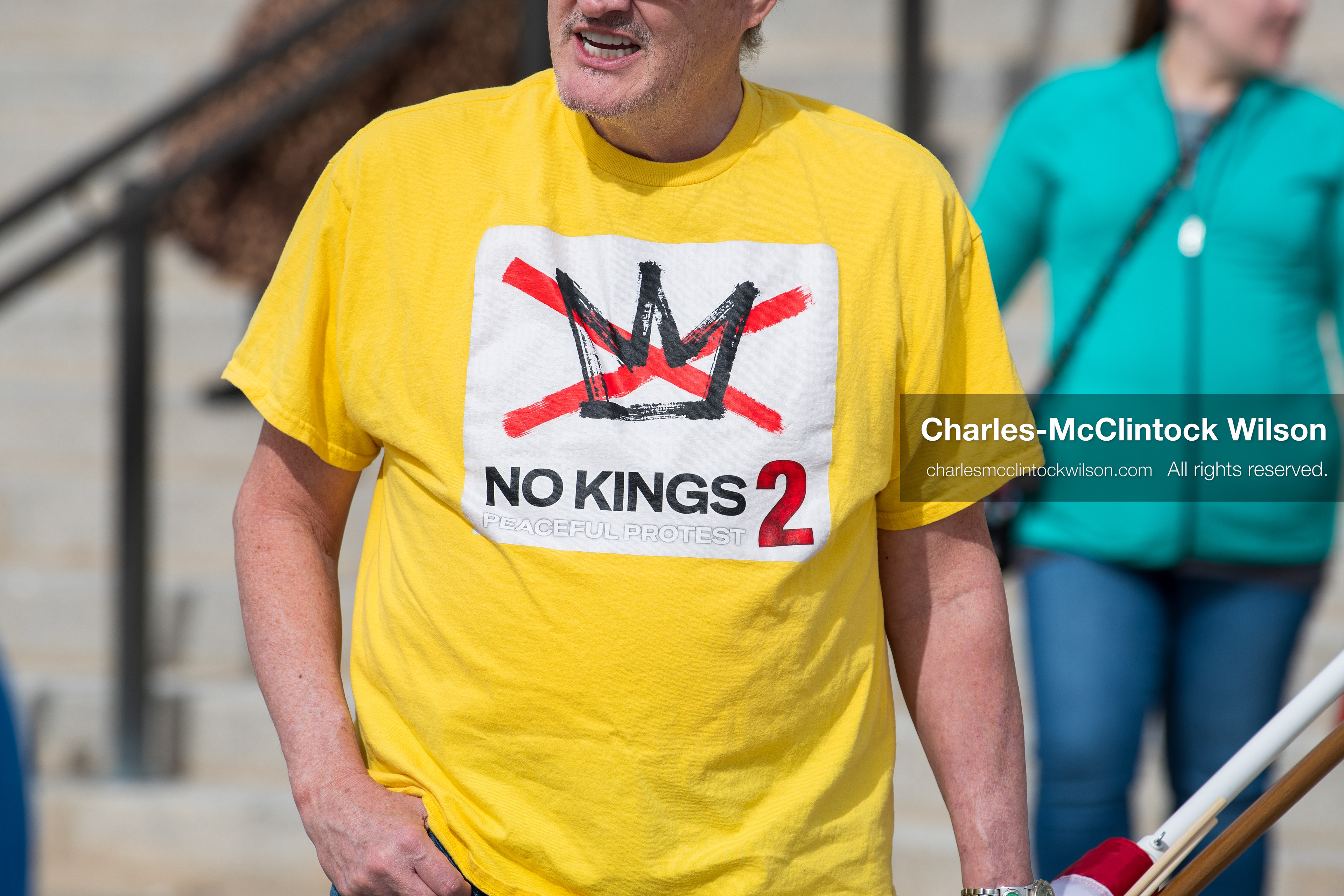 February 28, 2026, Salt Lake City, Utah, USA: A demonstrator wearing a yellow No Kings shirt stands near the Utah State Capitol during the Stand With Ukraine rally. The gathering marked the four year anniversary of the full scale Russian invasion of Ukraine and brought community members together in support of Ukrainians and local humanitarian efforts. (Credit Image: © Charles McClintock Wilson/ZUMA Press Wire)