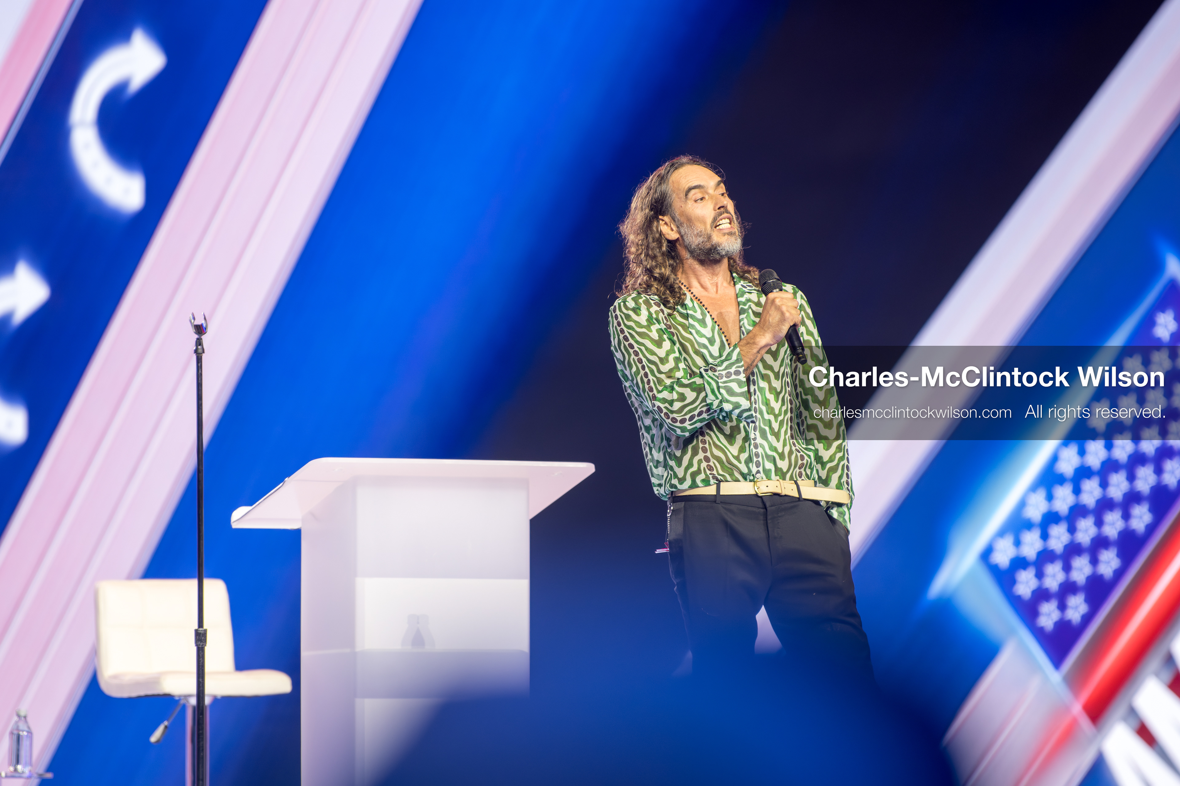 December 18, 2025, Phoenix, Arizona, USA: Russell Brand speaks during Day One of Turning Point USA’s AmericaFest 2025 at the Phoenix Convention Center in Phoenix, Arizona.   (Credit Image: © Charles‑McClintock Wilson/ZUMA Press Wire)