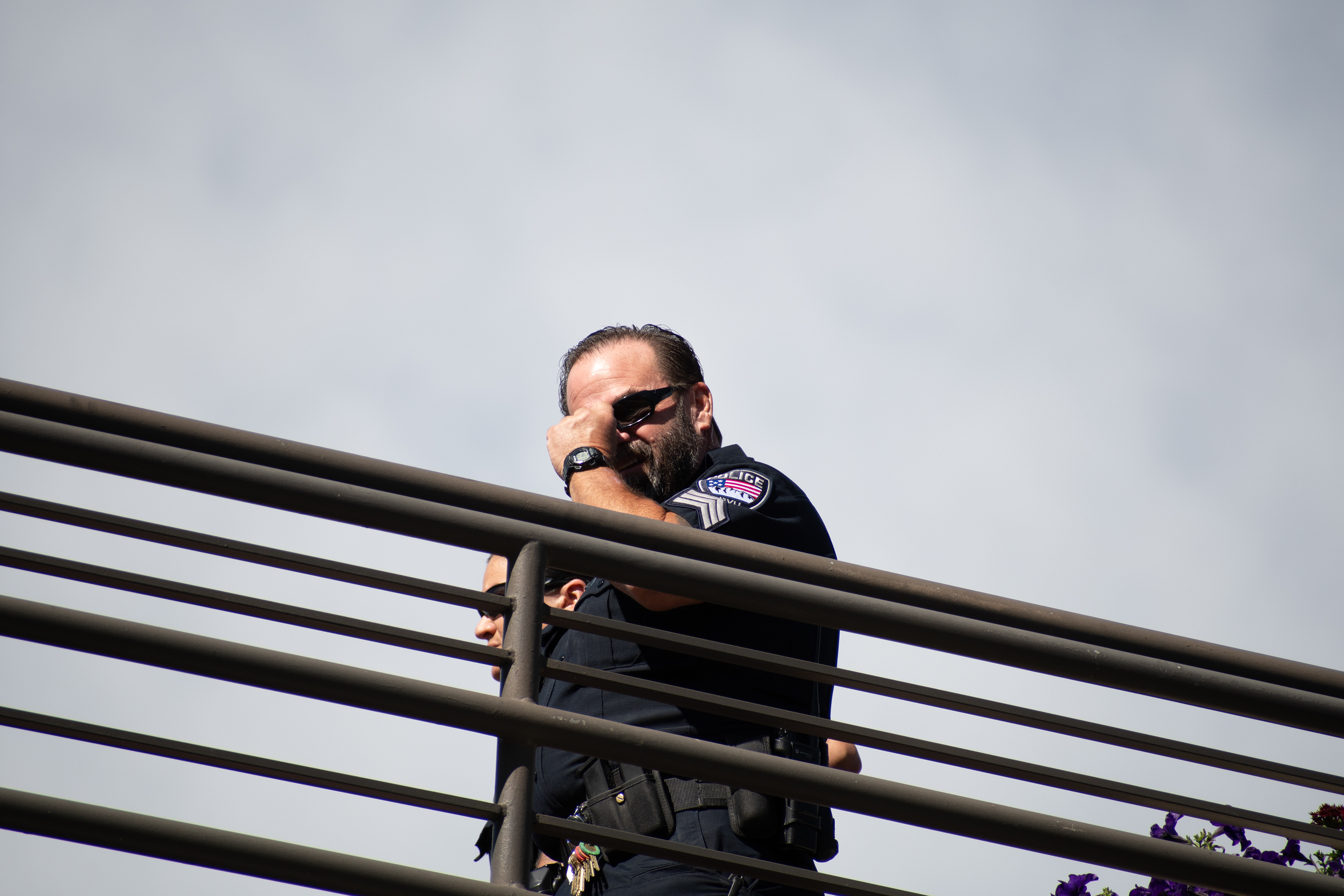 September 10, 2025 – Orem, Utah, United States: A Utah Valley University police officer maintains a security post on an elevated walkway ahead of a scheduled public event featuring conservative activist Charlie Kirk. Photograph by Charles‑McClintock Wilson / ZUMA Press Wire
