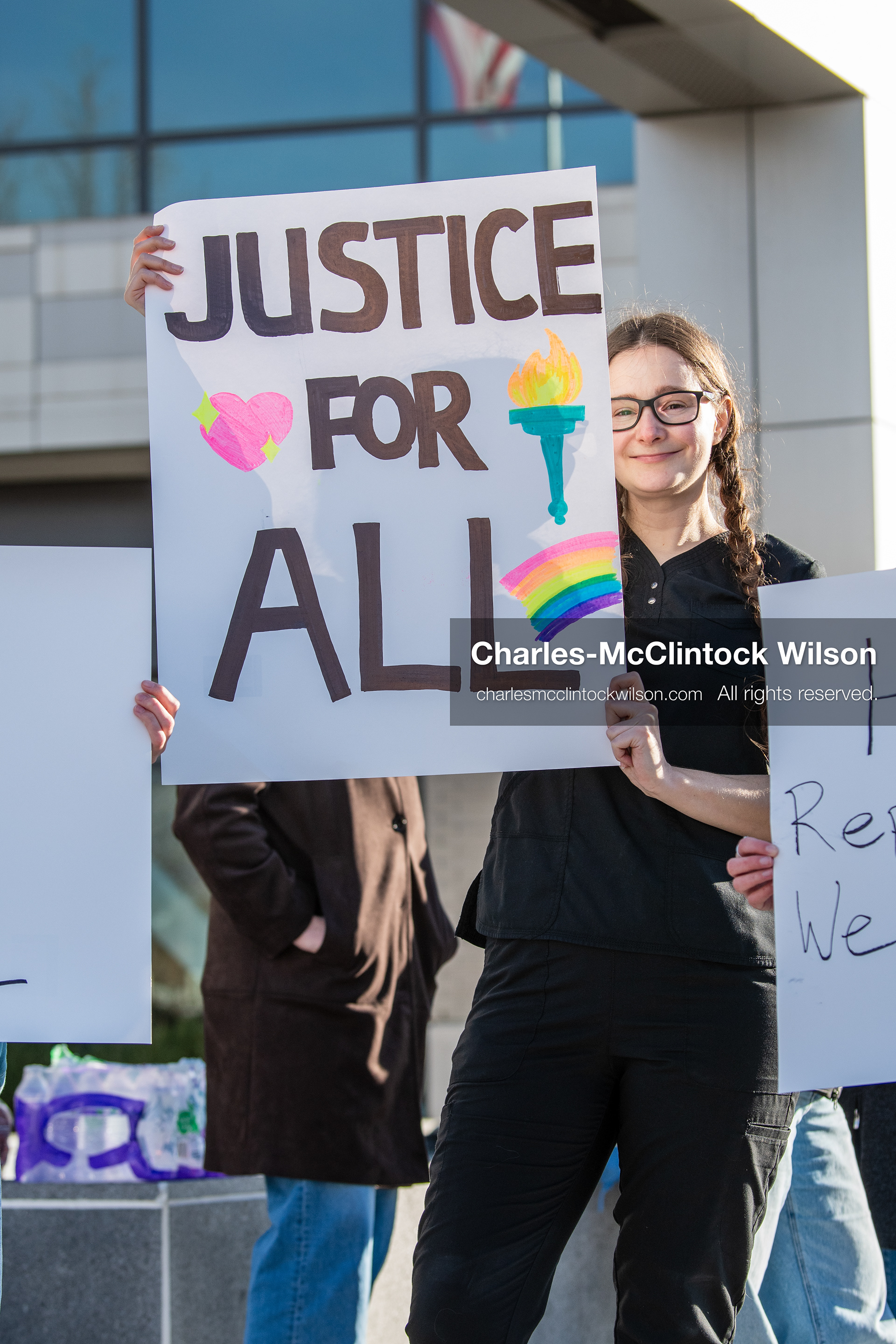  January 20, 2026, Provo, Utah, USA: A demonstrator stands outside Provo City Hall during the Free America Walkout protest in Provo Utah on January 20 2026. The nationwide event called for immigration reform and changes to detention practices.