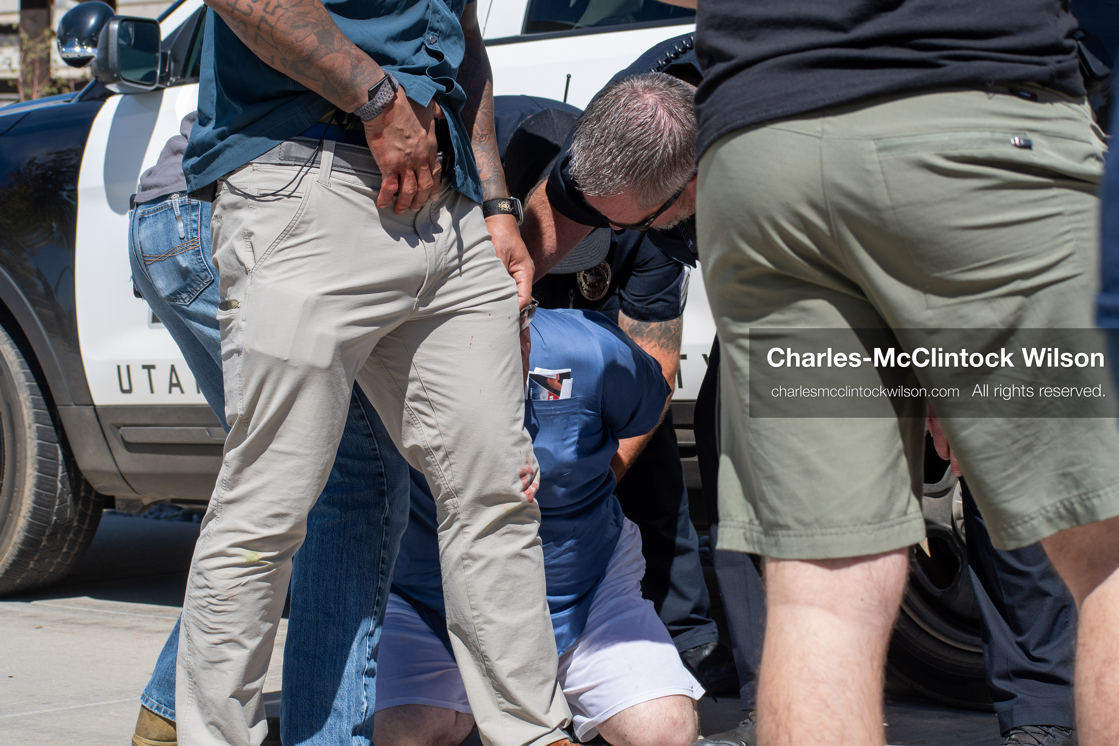 September 10, 2025, Orem, Utah, USA: George Zinn is taken into custody by campus security following the fatal shooting of Charlie Kirk during a public event at Utah Valley University. At the time of the arrest, Zinn was identified as the alleged shooter. He was later released and subsequently arrested on unrelated charges. Law enforcement confirmed that the actual suspect remained at large during this initial response. (Credit Image: © Charles-McClintock Wilson/ZUMA Press Wire)