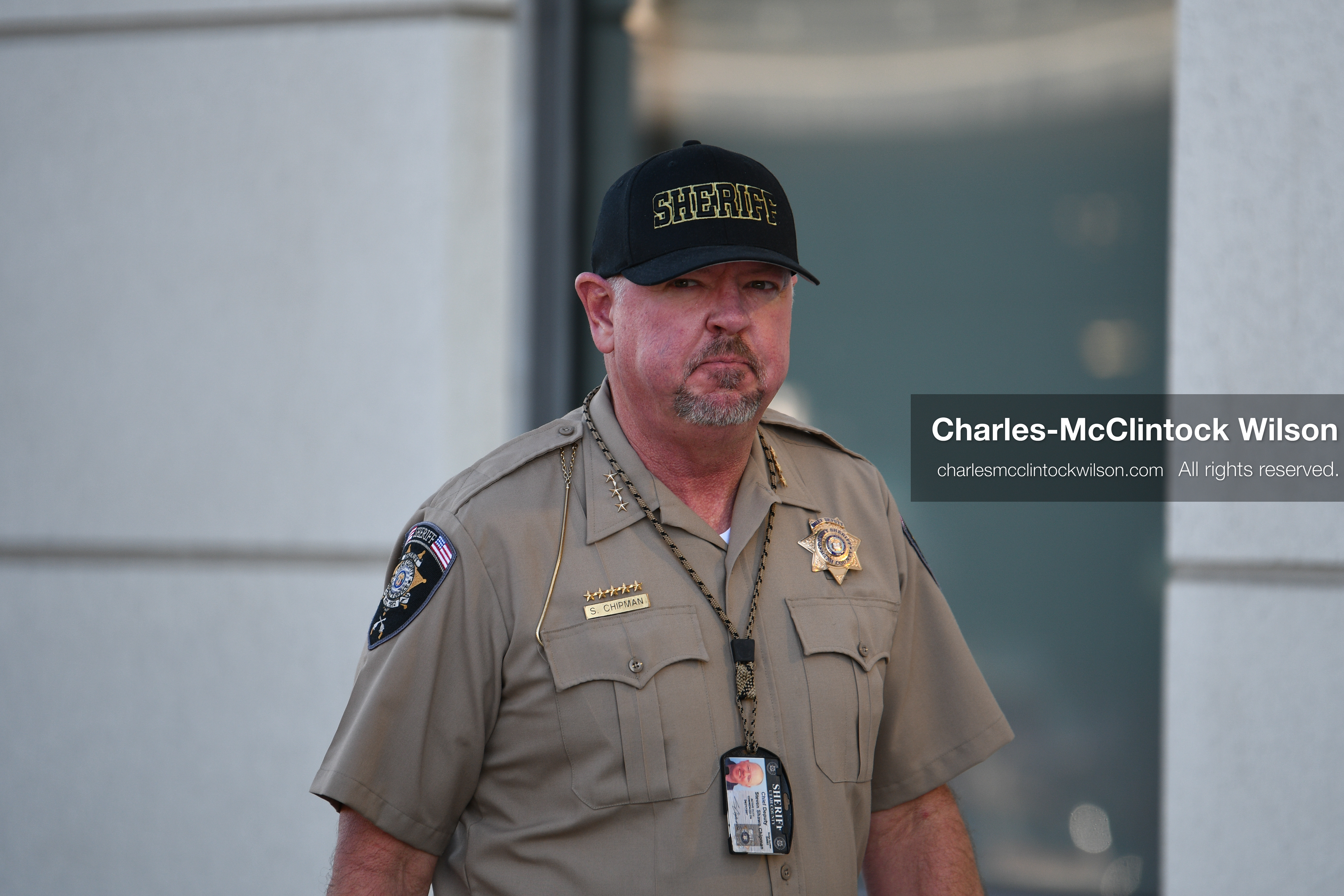 PROVO, UTAH, USA – DECEMBER 11, 2025: A Utah County Sheriff’s Office officer patrols the parking lot of the Fourth District Court in Provo during the first in‑person court appearance of Tyler Robinson in the Charlie Kirk murder case. (Credit Image: © Charles‑McClintock Wilson/ZUMA Press Wire)