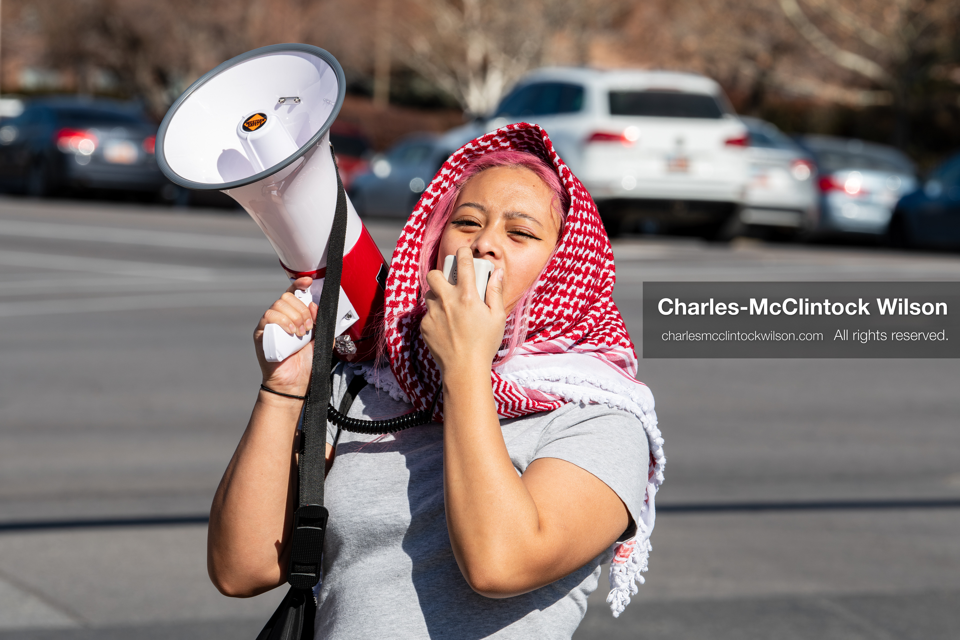 February 5, 2026, Provo, Utah, USA: A person speaks into a megaphone near Brigham Young University in Provo during a protest opposing the presence of US Customs and Border Protection recruiters at a career fair held on the BYU campus. (Credit Image: © Charles McClintock Wilson/ZUMA Press Wire)
