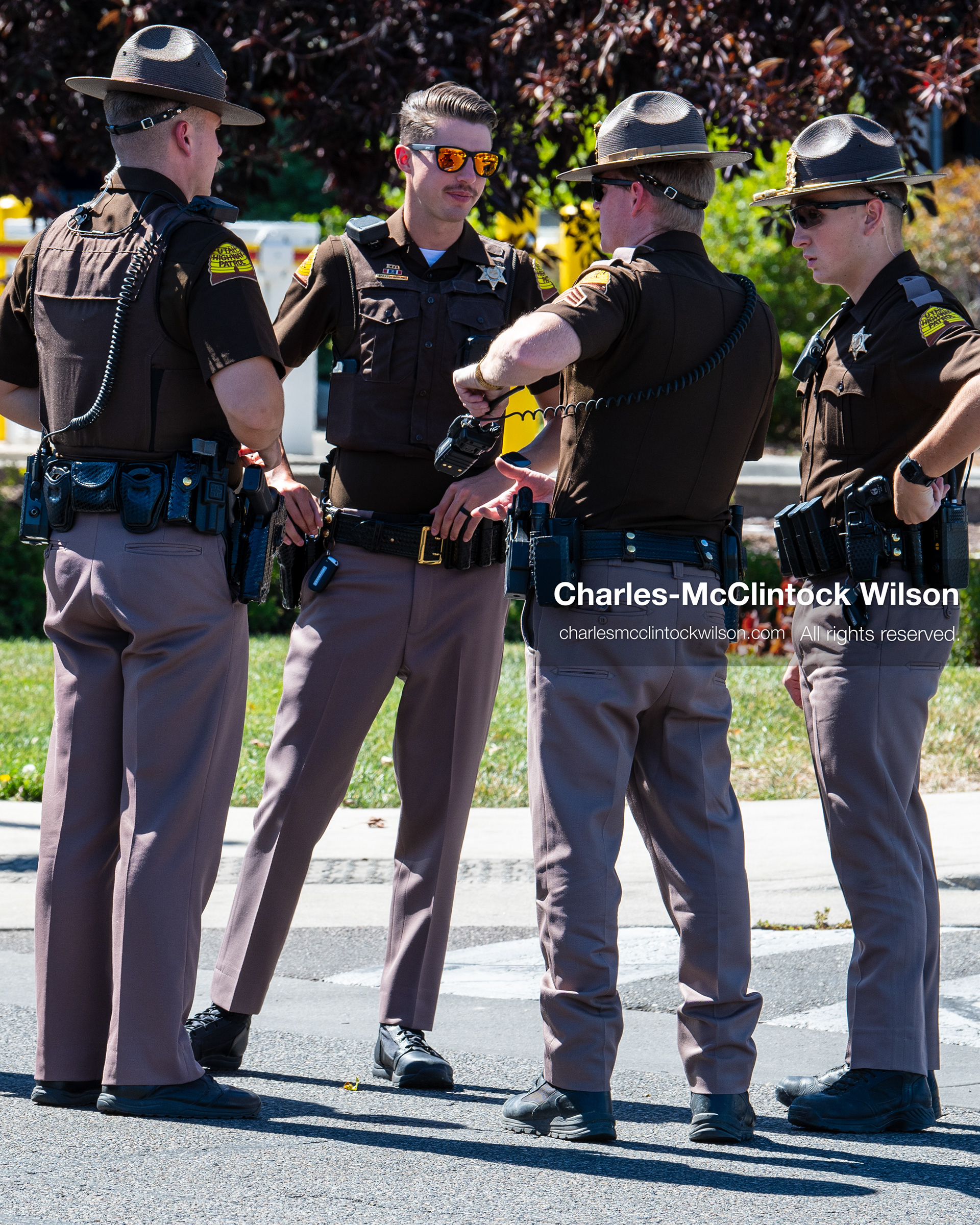 Utah Highway Patrol troopers gather and speak outside Intermountain Medical Center in Murray, Utah, on Monday, August 17, 2026. Multiple regional law enforcement agencies converged to heavily secure the hospital perimeter as a safety precaution after shooting victims arrived from a fatal shootout that erupted outside a funeral service in nearby Kearns earlier that day. (Photo by Charles-McClintock Wilson/Sipa USA)