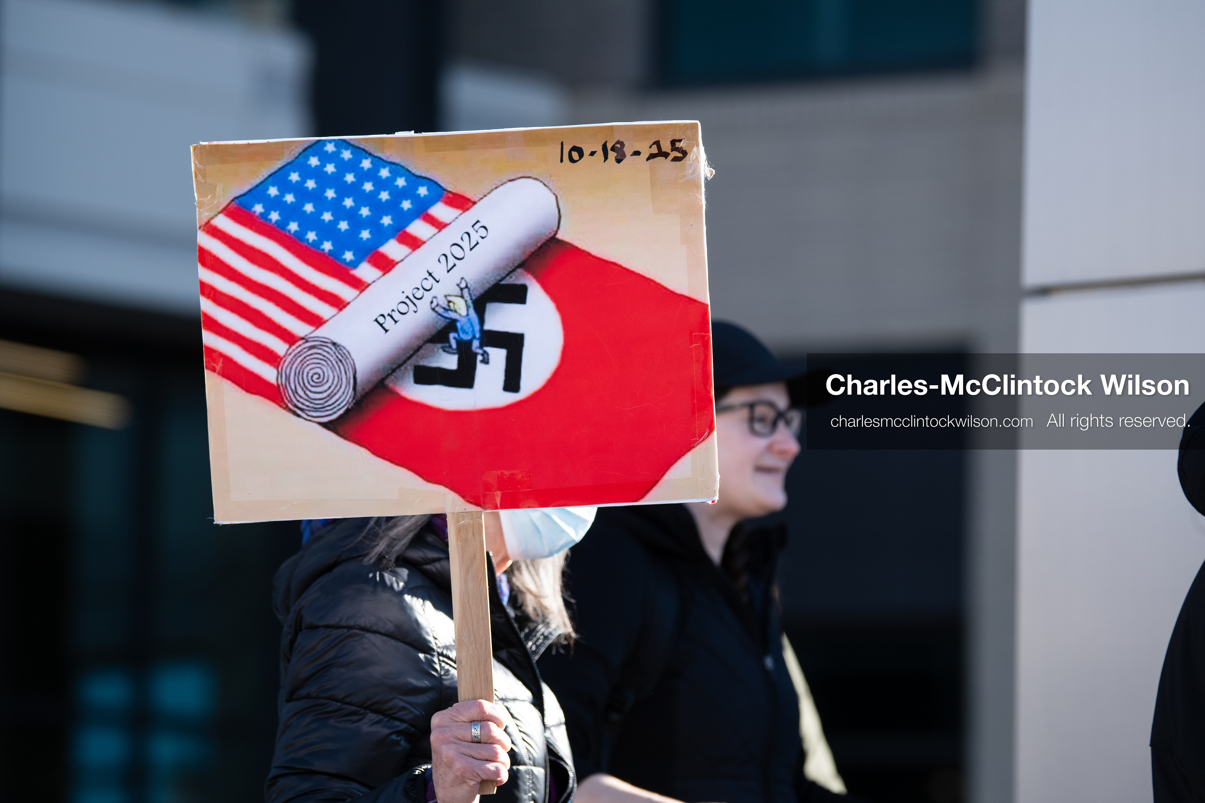 January 20, 2026, Provo, Utah, USA: A demonstrator stands outside Provo City Hall during the Free America Walkout protest in Provo Utah on January 20 2026. The nationwide event called for immigration reform and changes to detention practices. 