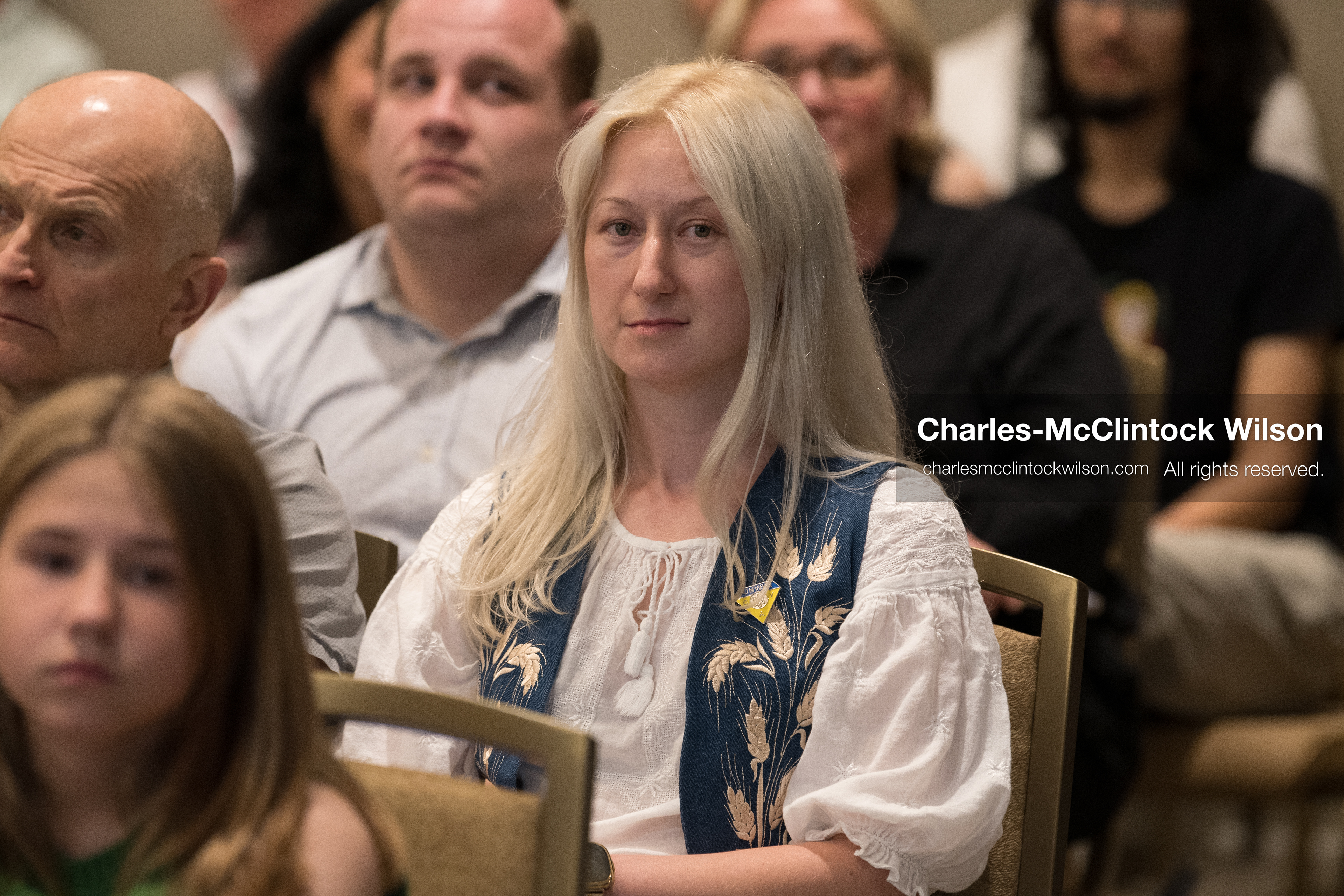 July 23, 2026, Salt Lake City, Utah, USA: IRYNA DUBENKO-LIPP (center) sits with audience members during a community meeting featuring Ukrainian activist Serhiy Prytula at the Utah State Capitol building in Salt Lake City, Utah, on Thursday, July 23, 2026. The event, titled ''Ukraine in the Fifth Year of the Full-Scale War: An Honest Conversation,'' was hosted by the Prytula Foundation USA to discuss civil defense and ongoing humanitarian aid initiatives. (Credit Image: © Charles-McClintock Wilson/ZUMA Press Wire)