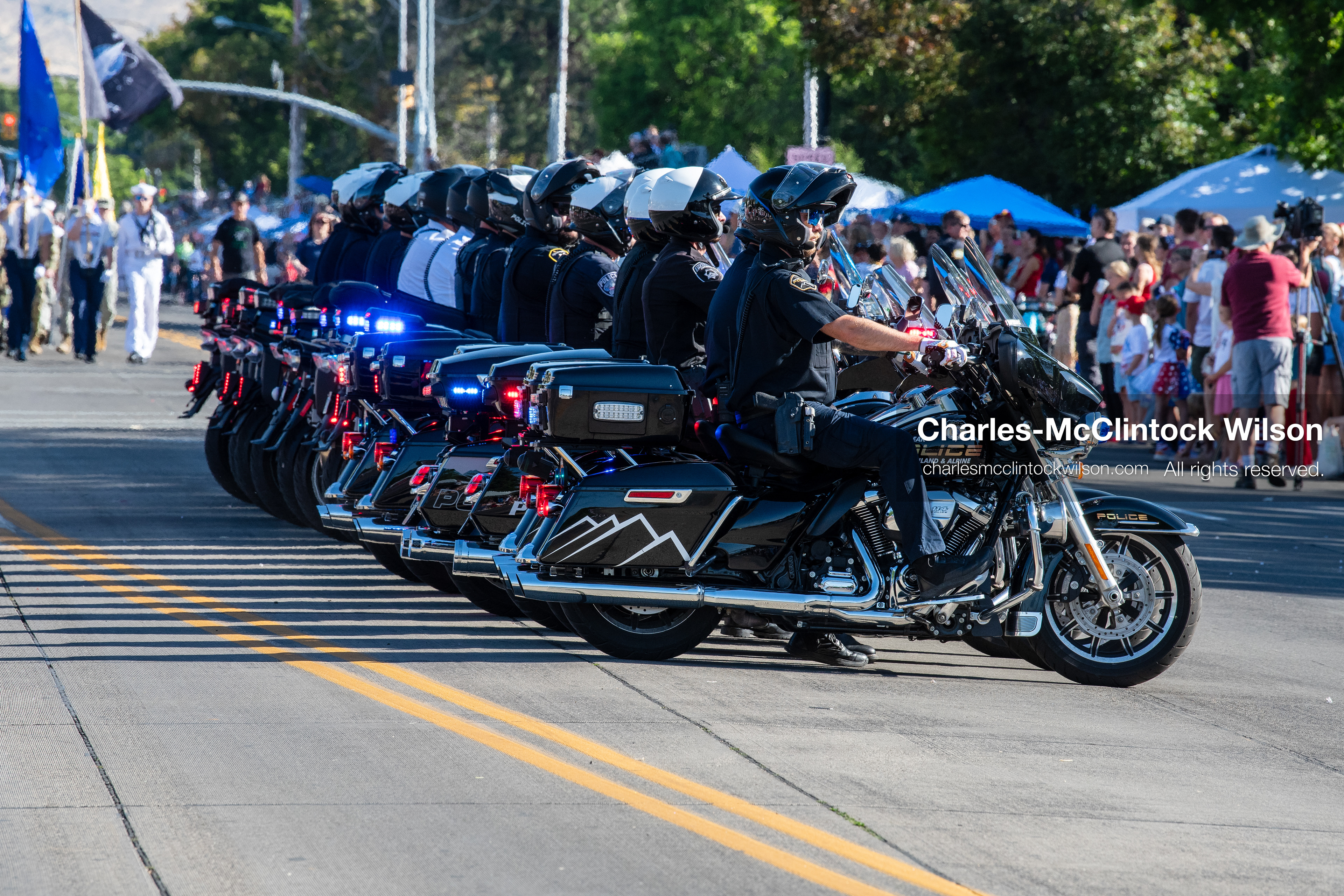 July 4, 2026, Provo, Utah, USA: Police motor officers line up their motorcycles with flashing emergency lights during America's Freedom Festival Grand Parade in Provo, Utah, Saturday, July 4, 2026. The annual Independence Day event features expanded programming to honor the 250th anniversary of United States independence. (Credit Image: © Charles-McClintock Wilson/ZUMA Press Wire)