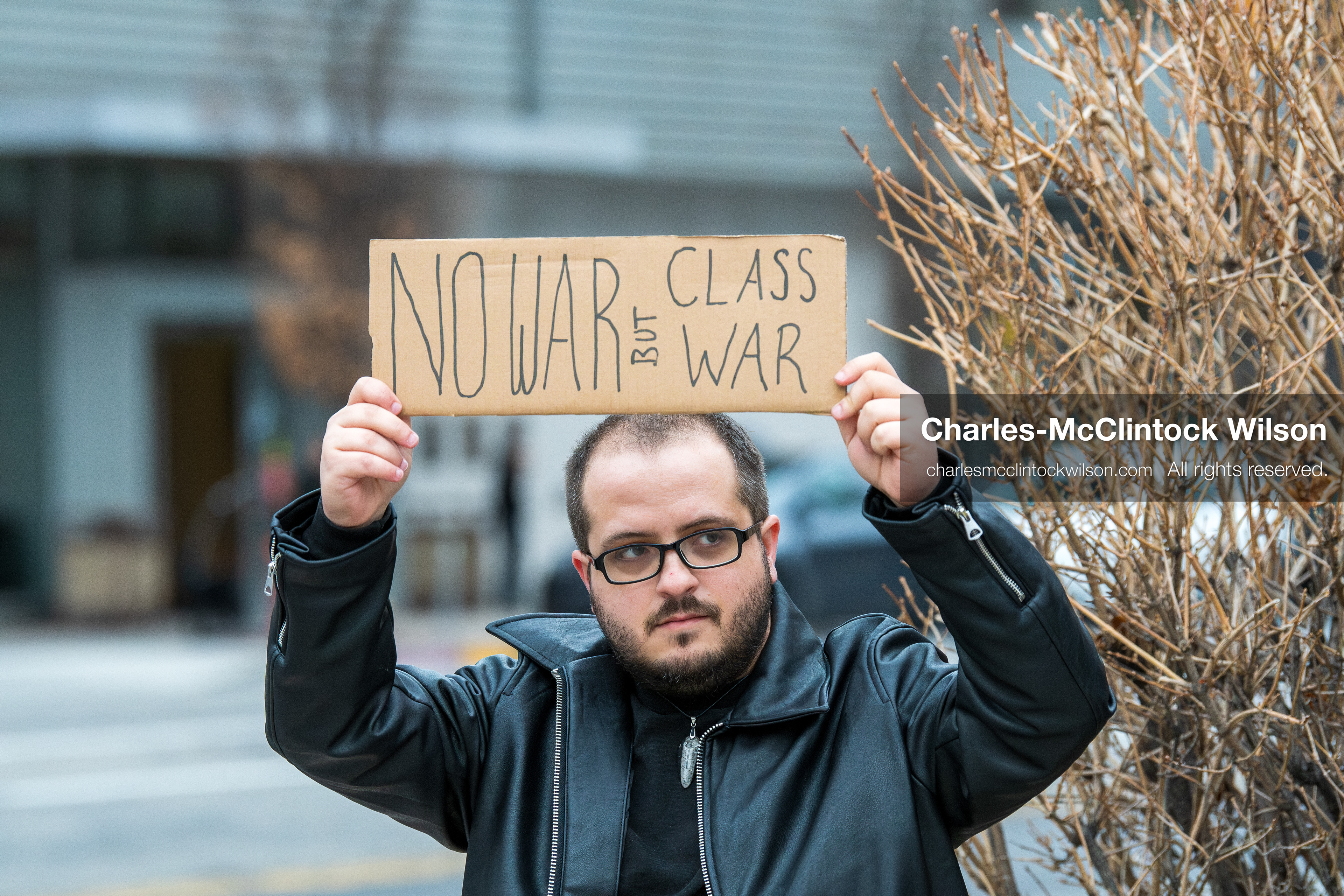 January 3, 2026, Salt Lake City, Utah, USA: A protester holds a sign during a demonstration against US action in Venezuela outside the Wallace Federal Building in Salt Lake City, Utah. The protest was part of a nationwide mobilization responding to recent military developments. (Credit Image: (c) Charles‑McClintock Wilson/ZUMA Press Wire)