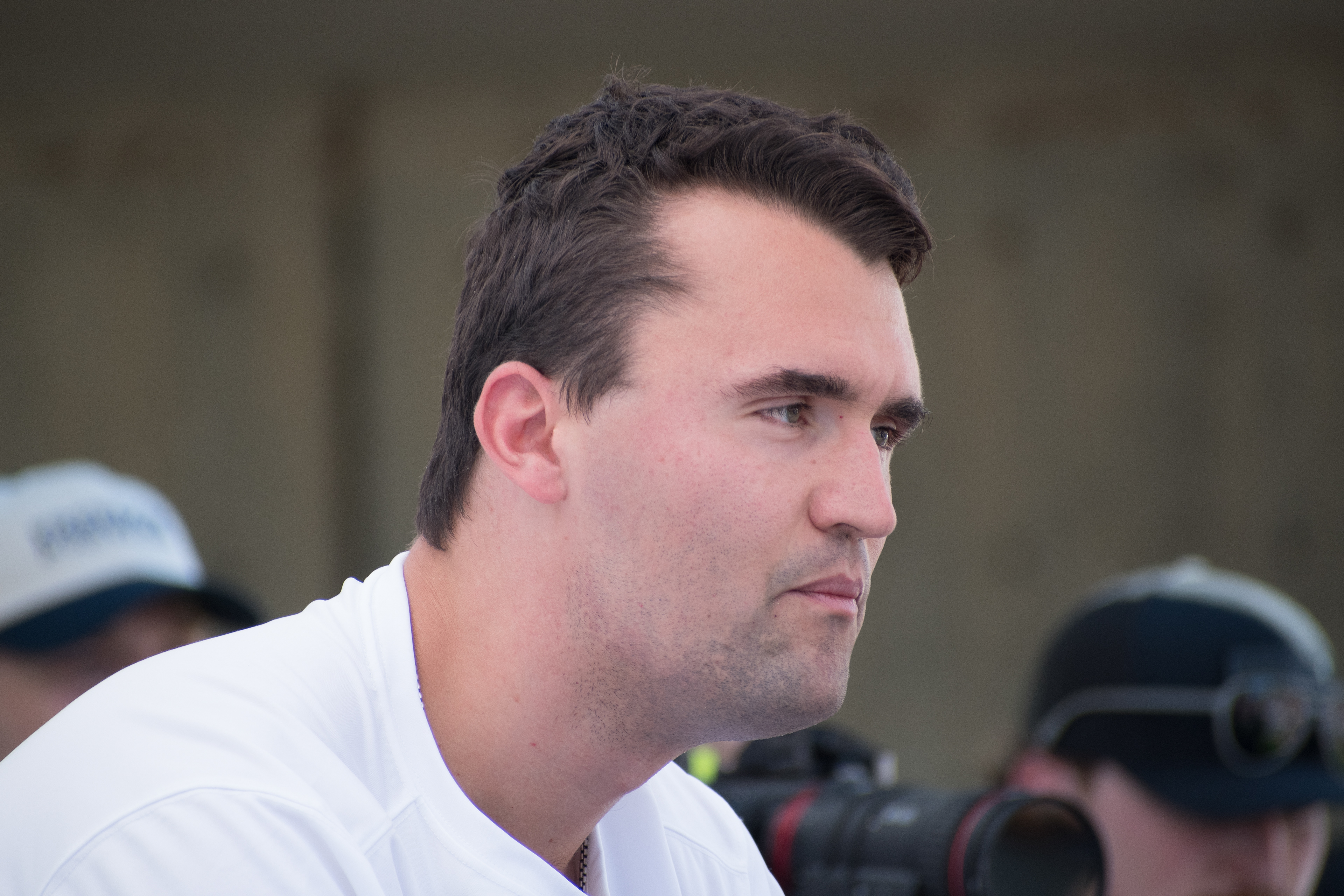  OREM, UTAH – SEPTEMBER 10, 2025: Charlie Kirk appears focused and resolute during a public event at Utah Valley University. Captured in a moment of quiet intensity, Kirk looks off-camera as media lenses track his movements. The image reflects the tension and conviction that defined his final public appearance before the shooting incident that disrupted the event. © Charles-McClintock Wilson / ZUMA Press