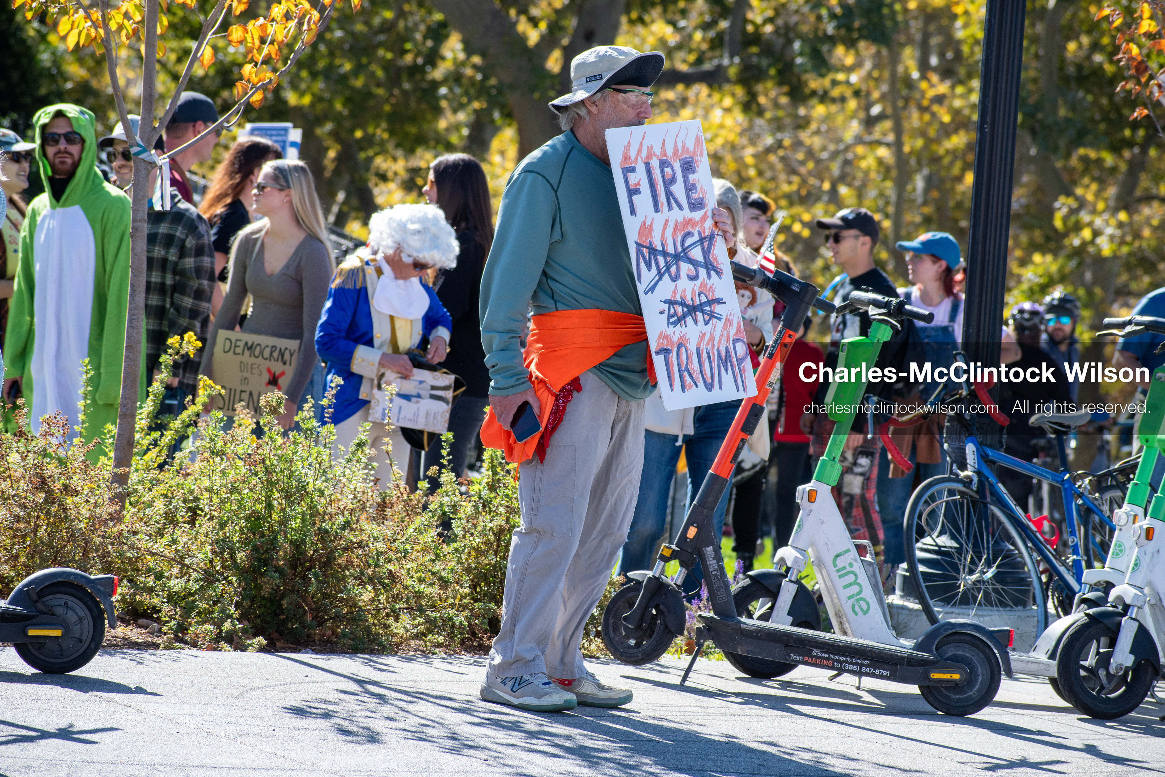 October 18, 2025, Salt Lake City, Utah, USA: Demonstrators hold signs during a "No Kings" protest at the Utah State Capitol. The protest was part of a nationwide mobilization. 