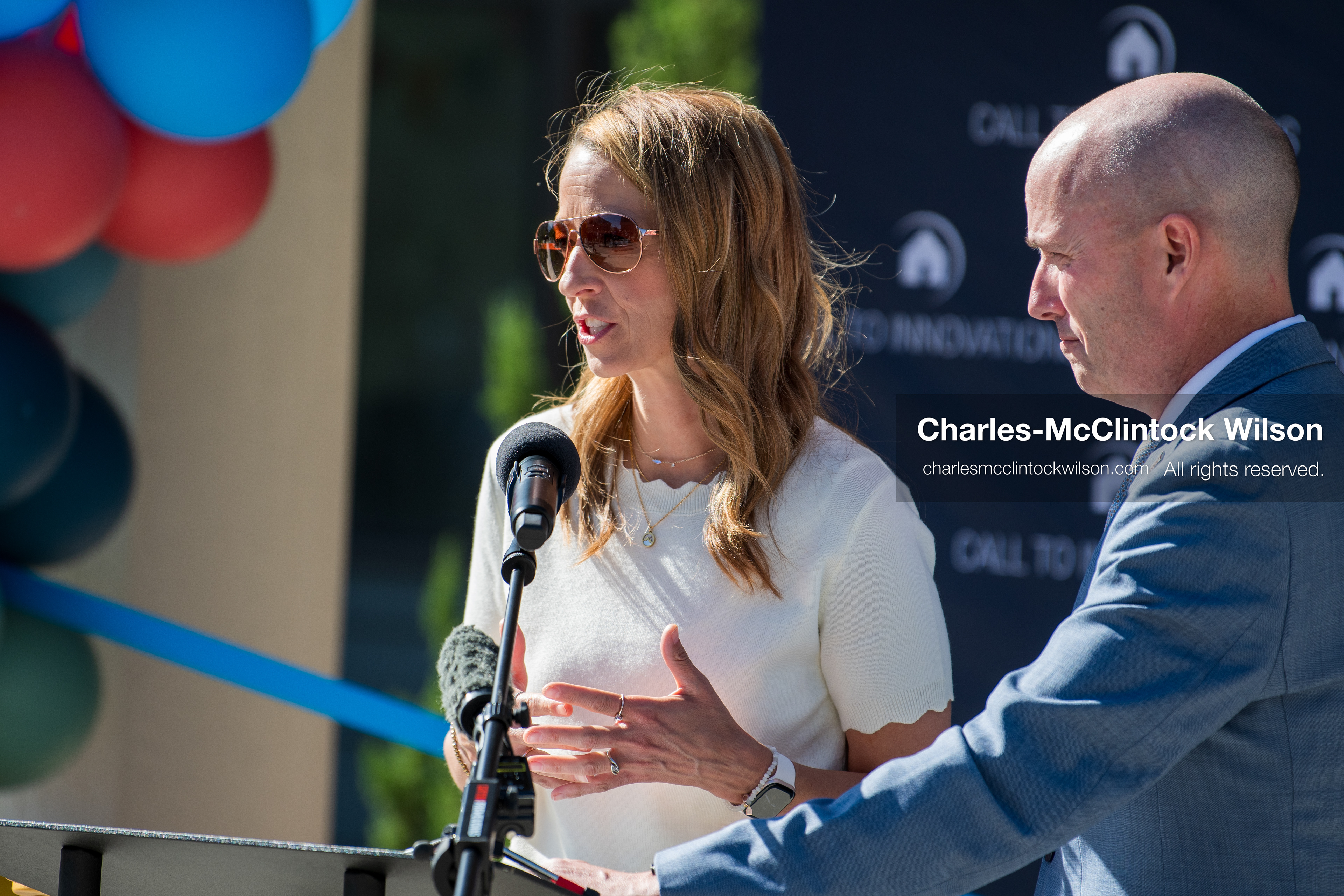 May 28, 2026, Lehi, Utah, USA: Utah First Lady ABBY COX speaks as Governor SPENCER COX looks on during the opening of Innovation Park at Holbrook Farms and the Lehi Rippy Literacy Center on May 28, 2026, in Lehi, Utah. (Credit Image: © Charles‑McClintock Wilson/ZUMA Press Wire)