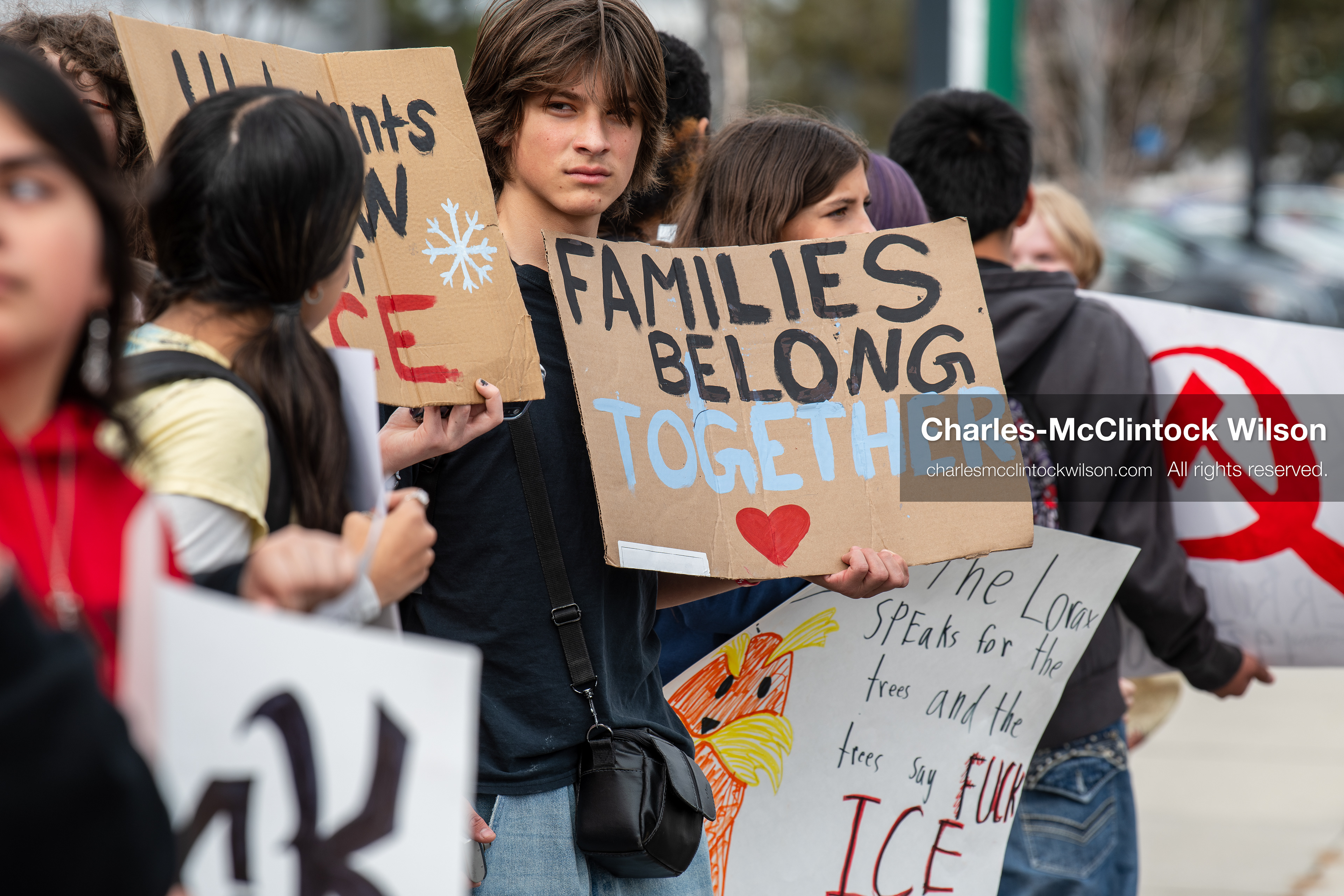 February 11, 2026, Orem, Utah, USA: Students stand on the sidewalk along State Street during a student‑led protest involving participants from multiple Orem schools. (Credit Image: © Charles‑McClintock Wilson/ZUMA Press Wire)