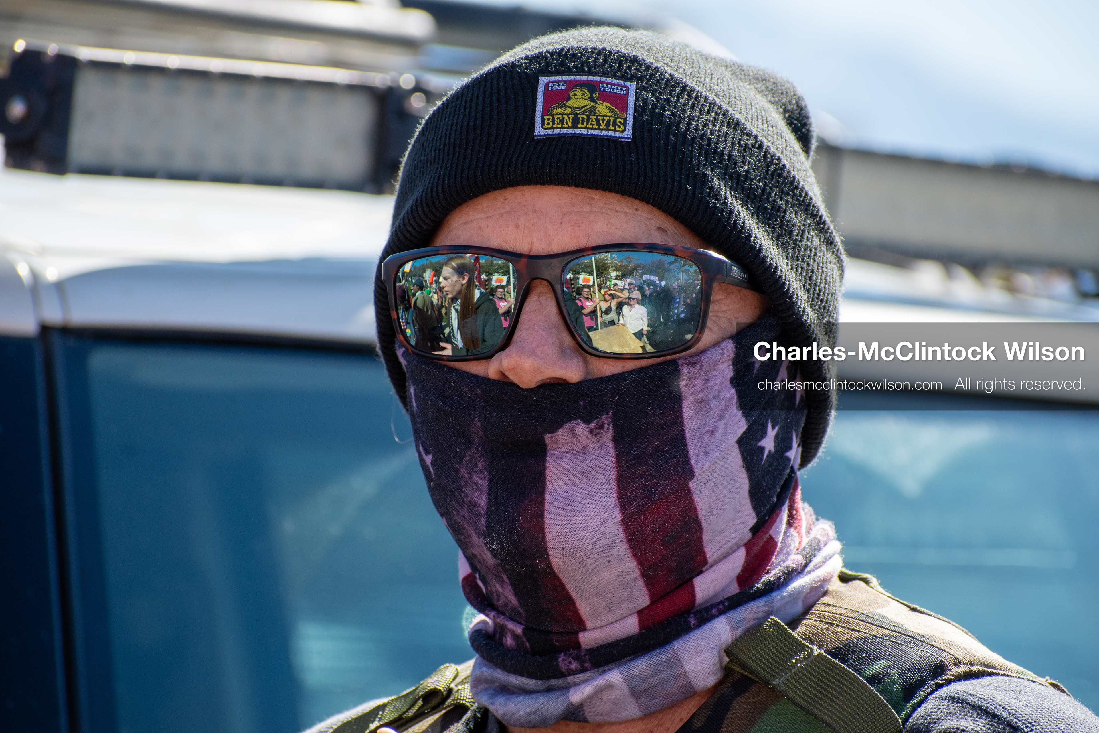 October 18, 2025, Salt Lake City, Utah, USA: A demonstrator wears tactical clothing and a face covering during a "No Kings" protest at the Utah State Capitol. The protest was part of a nationwide mobilization.