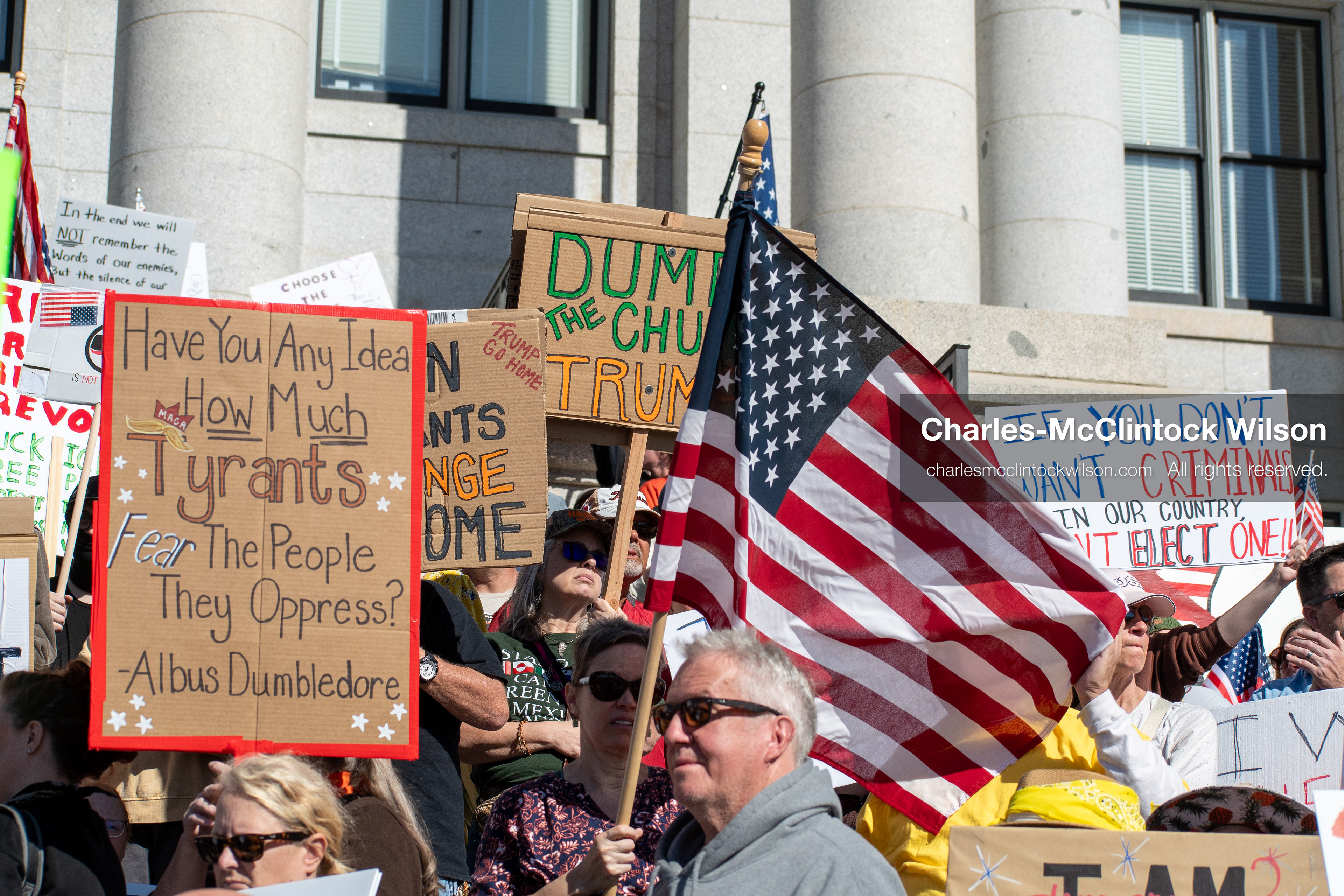 October 18, 2025, Salt Lake City, Utah, USA: Demonstrators participate in a "No Kings" protest held at the Utah State Capitol. Participants hold signs and flags during the public gathering.