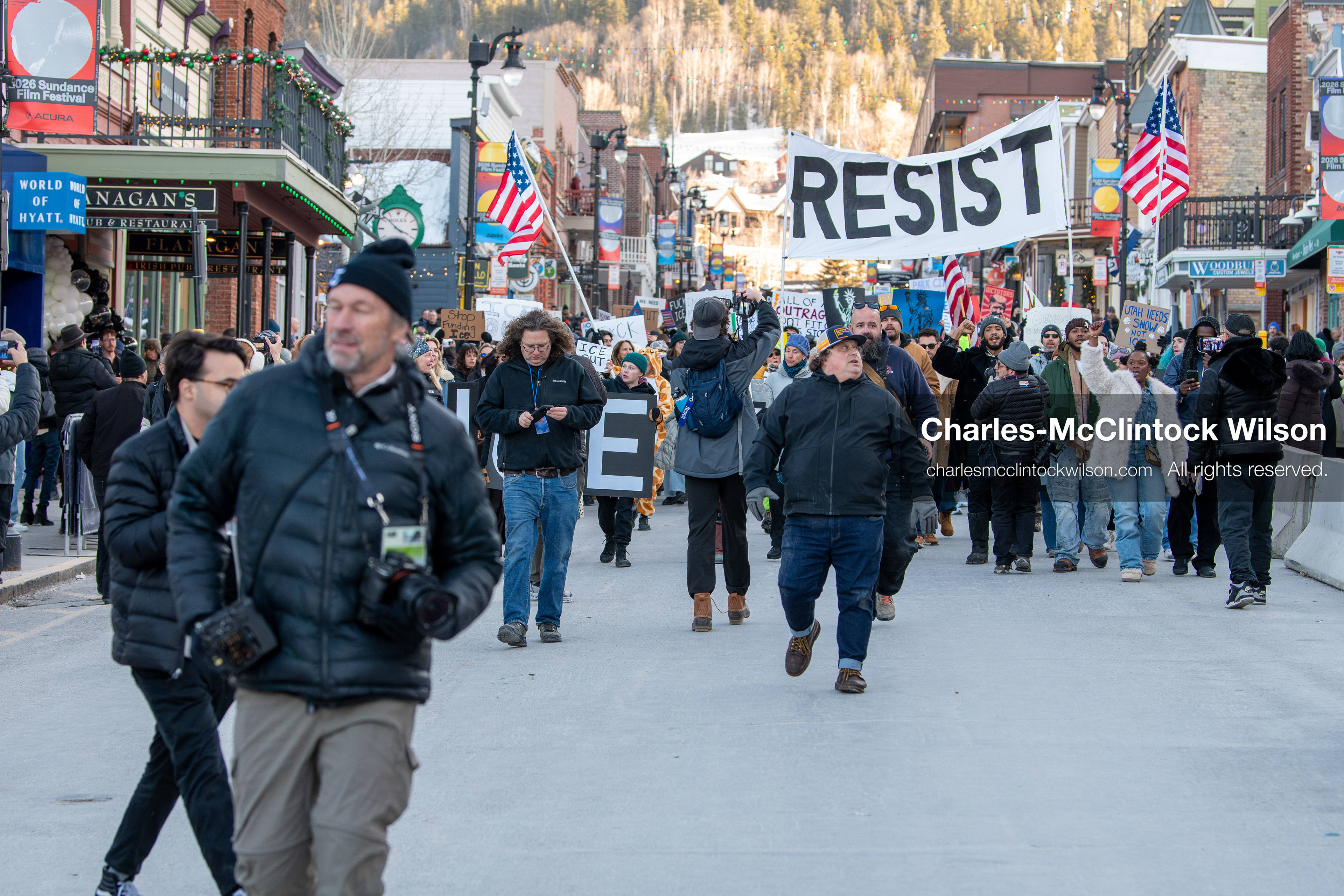 January 26, 2026, Park City, Utah, USA: Demonstrators march through Main Street holding signs during a protest opposing U.S. Immigration and Customs Enforcement (I.C.E.) ICE agents at the Sundance Film Festival in Park City, Utah, on Monday, Jan. 26, 2026. The event was held in response to the fatal shooting of Alex Pretti by a U.S. Border Patrol officer in Minneapolis. (Credit Image: © Charles McClintock Wilson/ZUMA Press Wire)