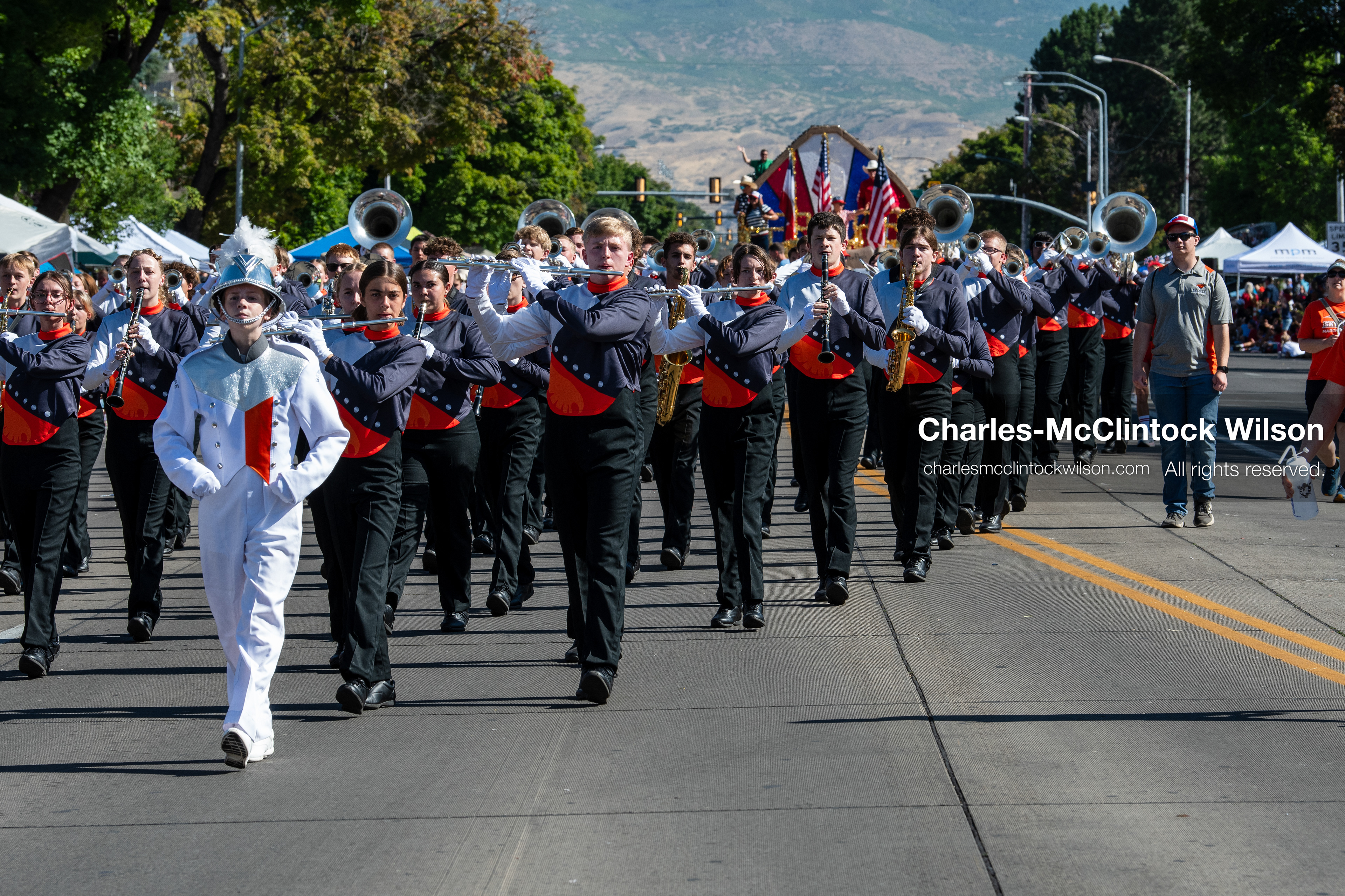 July 4, 2026, Provo, Utah, USA: Members of a high school marching band dressed in maroon and black uniforms play brass instruments while marching down the street during America's Freedom Festival Grand Parade in Provo, Utah, Saturday, July 4, 2026. The annual Independence Day event features expanded programming to honor the 250th anniversary of United States independence. (Credit Image: © Charles-McClintock Wilson/ZUMA Press Wire)