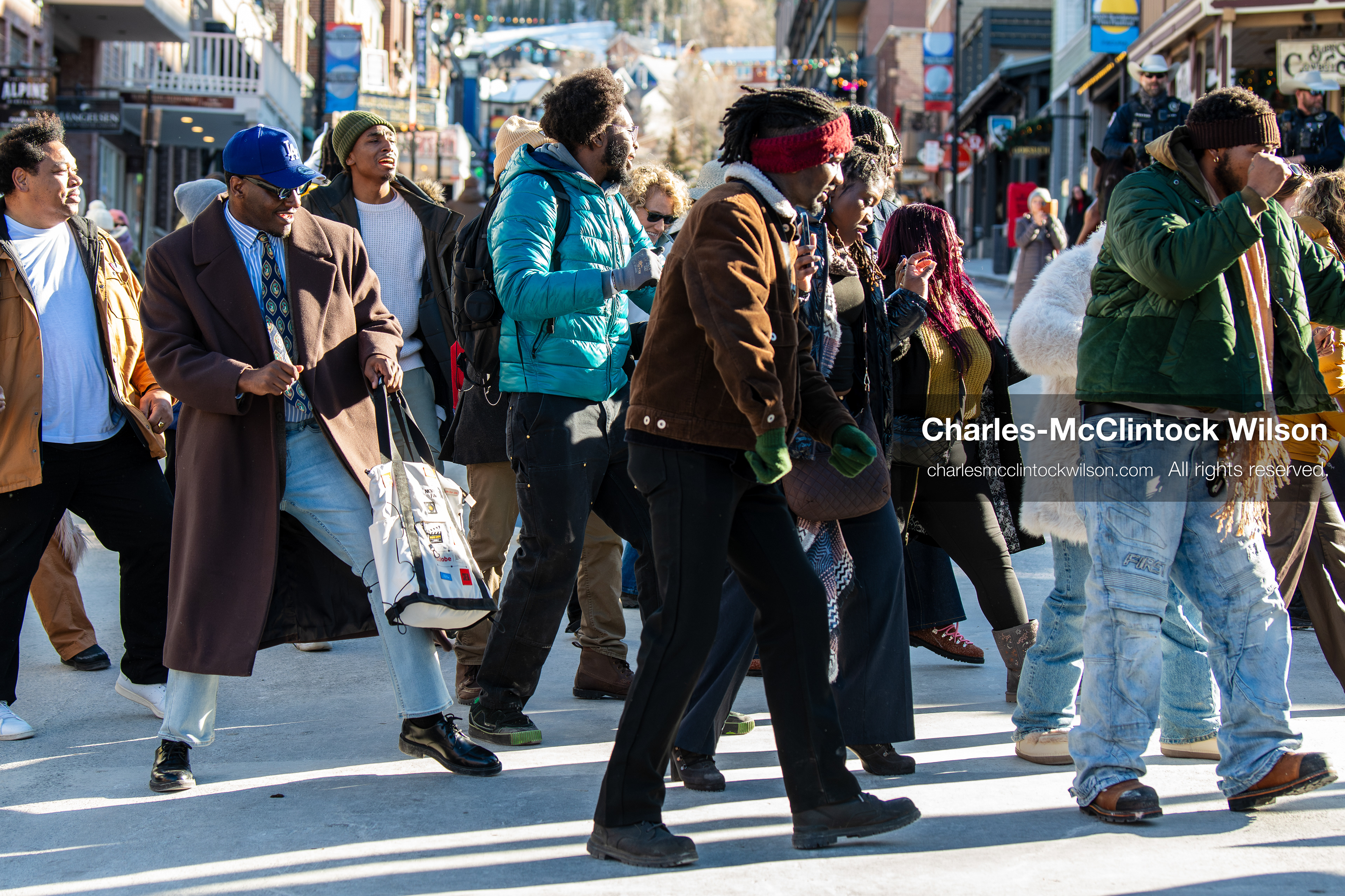 January 26, 2026, Park City, Utah, USA: Demonstrators dance on Main Street during a protest opposing U.S. Immigration and Customs Enforcement (I.C.E.) ICE agents at the Sundance Film Festival in Park City, Utah, on Monday, Jan. 26, 2026. The event was held in response to the fatal shooting of Alex Pretti by a U.S. Border Patrol officer in Minneapolis. (Credit Image: © Charles McClintock Wilson/ZUMA Press Wire)