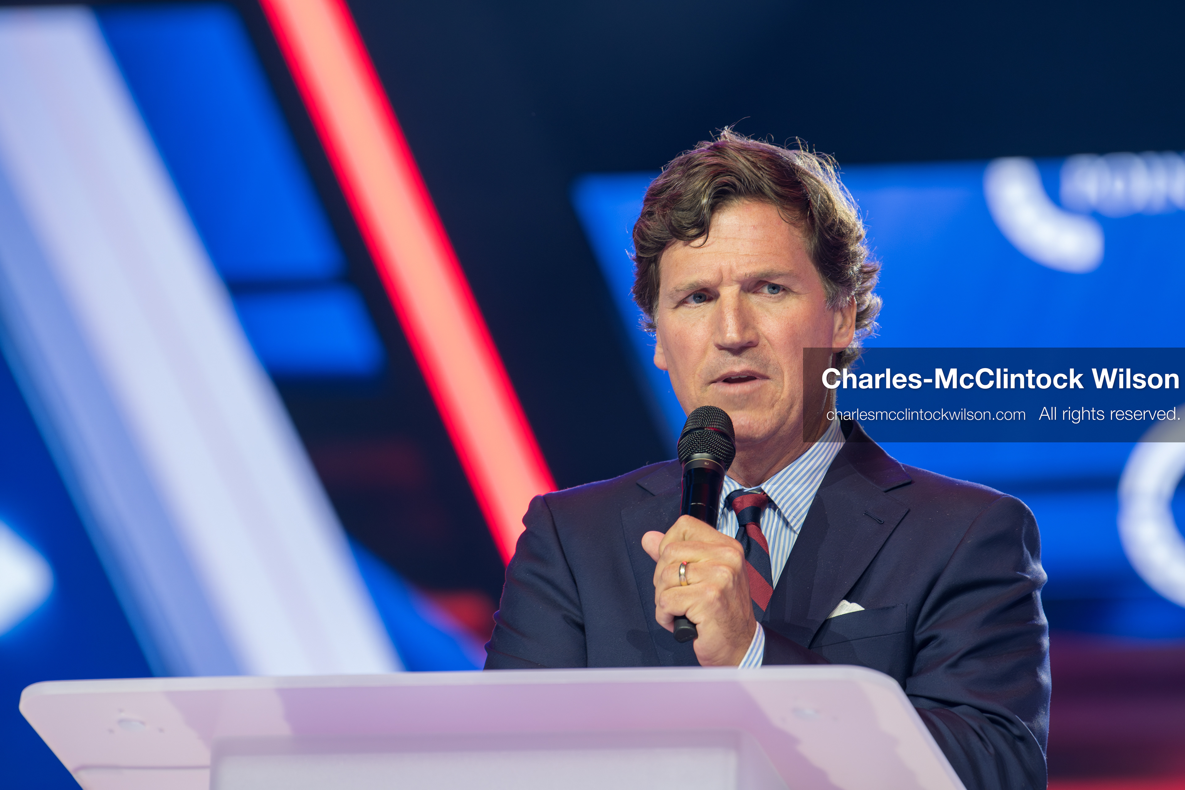 December 18, 2025, Phoenix, Arizona, USA: Tucker Carlson speaks on Day One of Turning Point USA’s AmericaFest 2025 at the Phoenix Convention Center in Phoenix, Arizona.   (Credit Image: © Charles‑McClintock Wilson/ZUMA Press Wire)