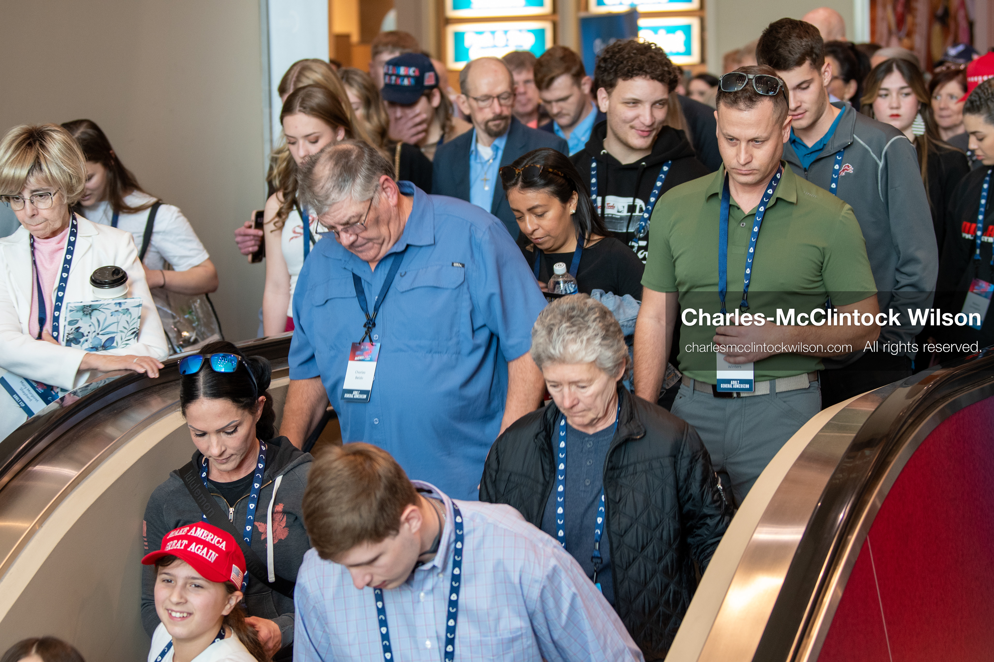 December 18, 2025, Phoenix, Arizona, USA: Attendees gather near an escalator during AmericaFest 2025 at the Phoenix Convention Center, the first edition of the event held since the death of Charlie Kirk. (Credit Image: (c) Charles-McClintock Wilson/ZUMA Press Wire)