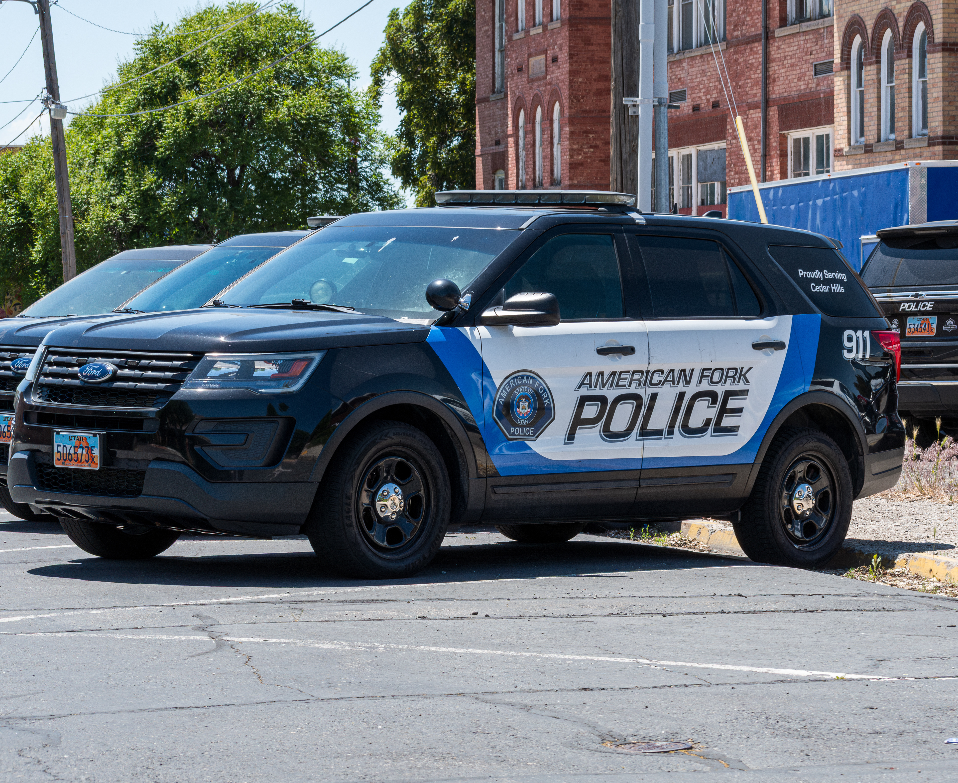 American Fork, Utah – June 2, 2025. Police vehicles are parked outside the American Fork Police Department headquarters.