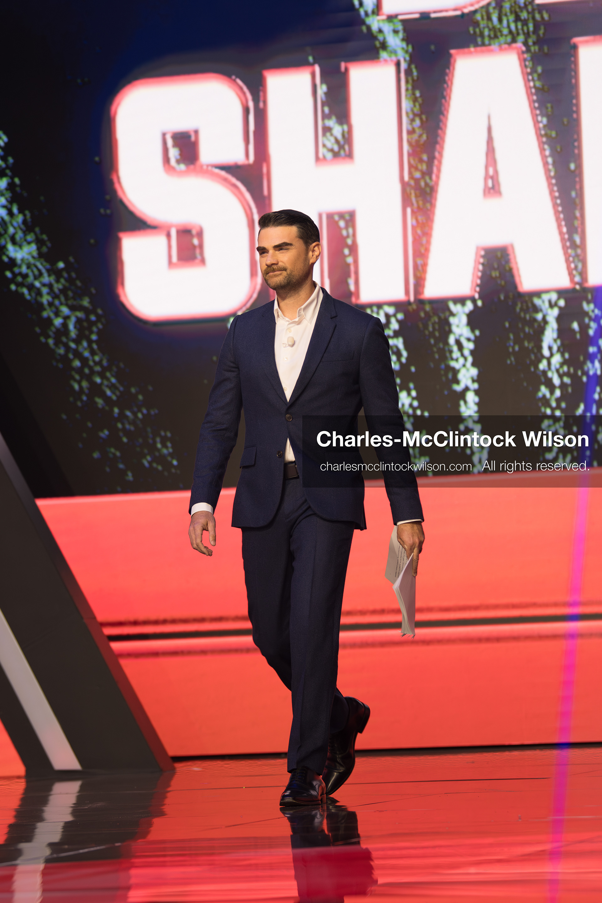 December 18, 2025, Phoenix, Arizona, USA: Ben Shapiro walks toward the stage during Day One of Turning Point USA’s AmericaFest 2025 at the Phoenix Convention Center in Phoenix, Arizona.