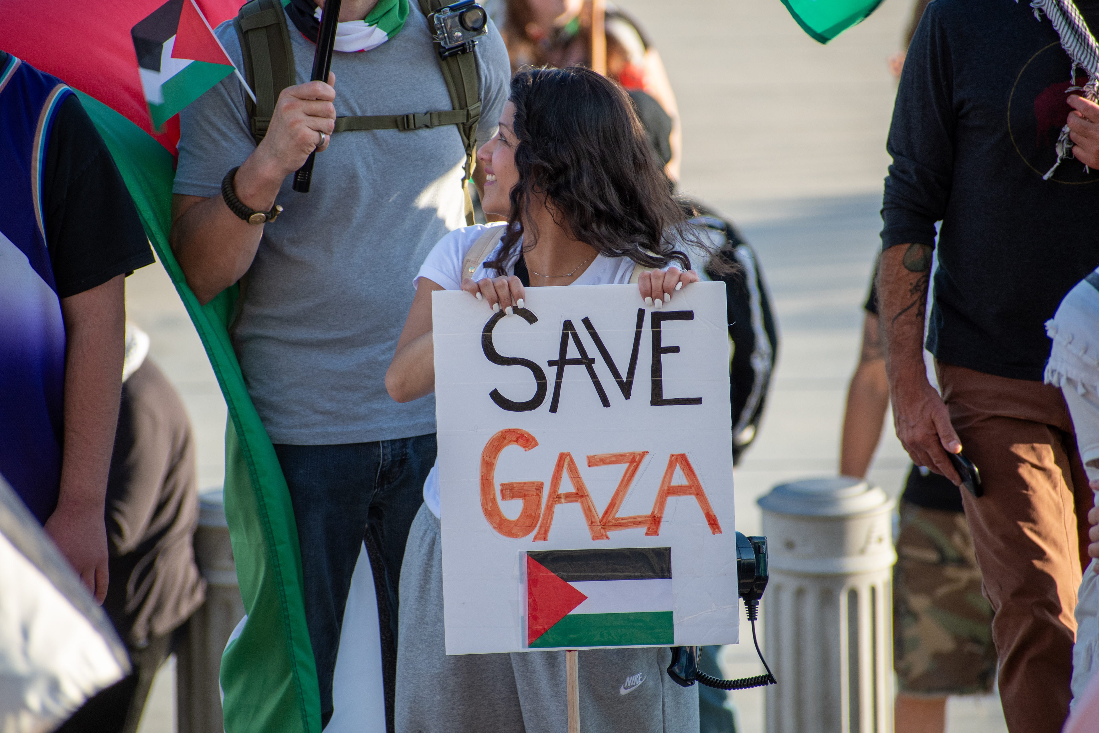  October 10, 2025, Salt Lake City, Utah, USA: A demonstrator holds a sign reading â€œSAVE GAZAâ€ during the Free Palestine Rally organized in front of the Utah State Capitol. The sign features the Palestinian flag as participants gather in support of Palestinian rights. (Credit Image: © Charles-McClintock Wilson/ZUMA Press Wire)