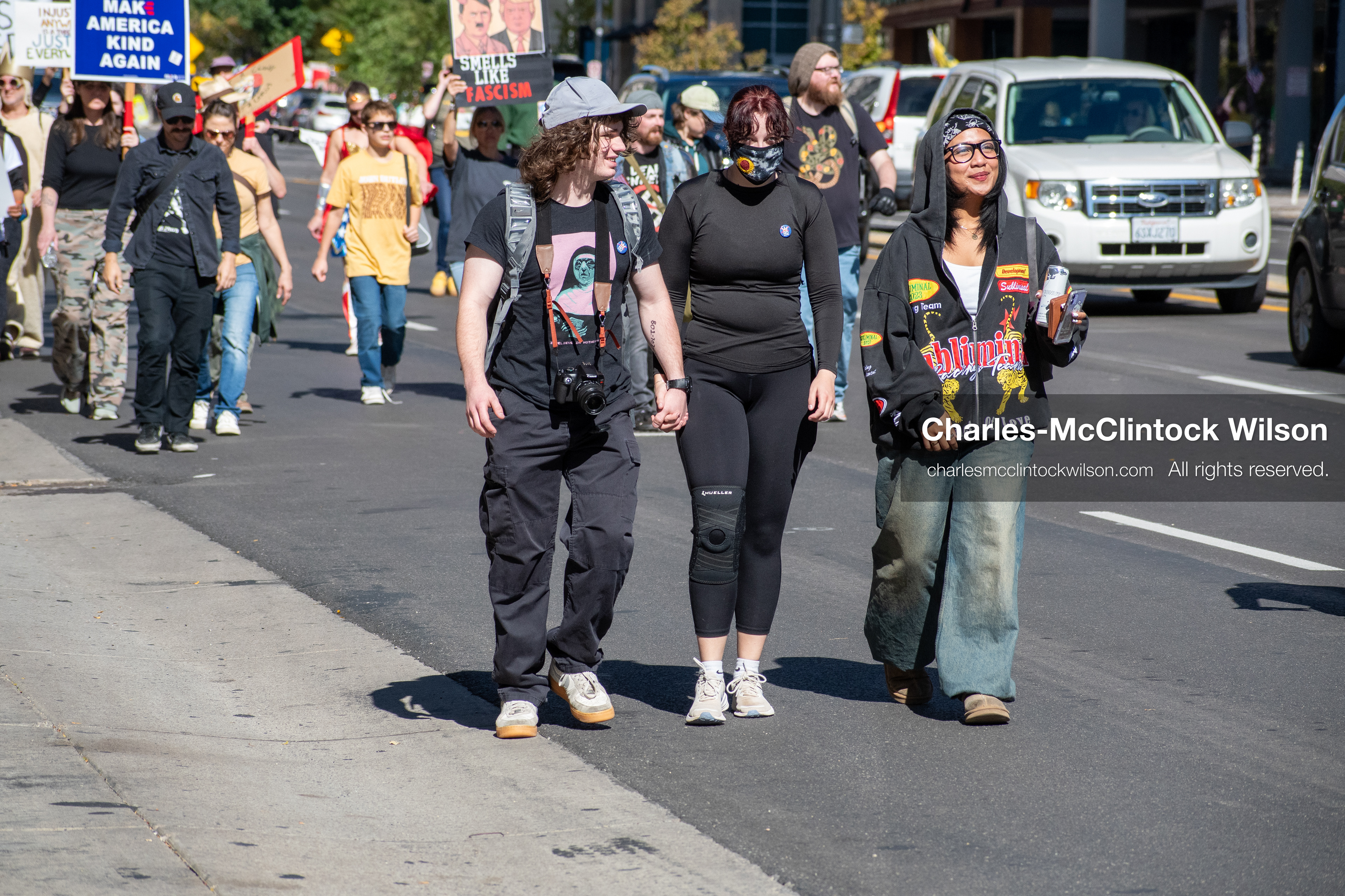 October 18, 2025, Salt Lake City, Utah, USA: Demonstrators march along South State Street during a "No Kings" protest in Salt Lake City, Utah. The protest was part of a nationwide mobilization.