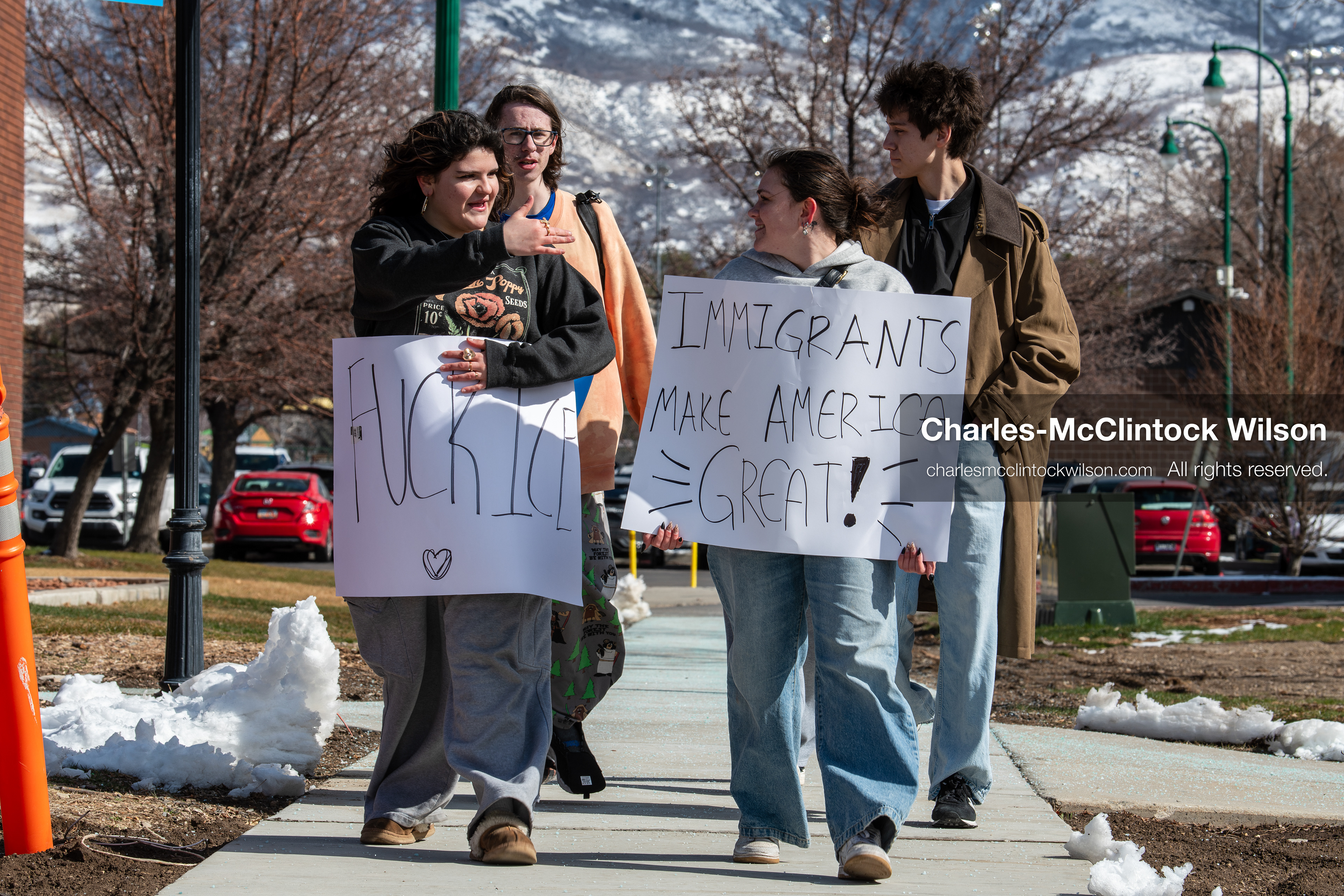 February 20, 2026, Orem, Utah, USA: Participants walk together during a student led protest against ICE in front of Orem City Hall. Some carry signs as the group moves along State Street during the event. (Credit Image: © Charles McClintock Wilson/ZUMA Press Wire)