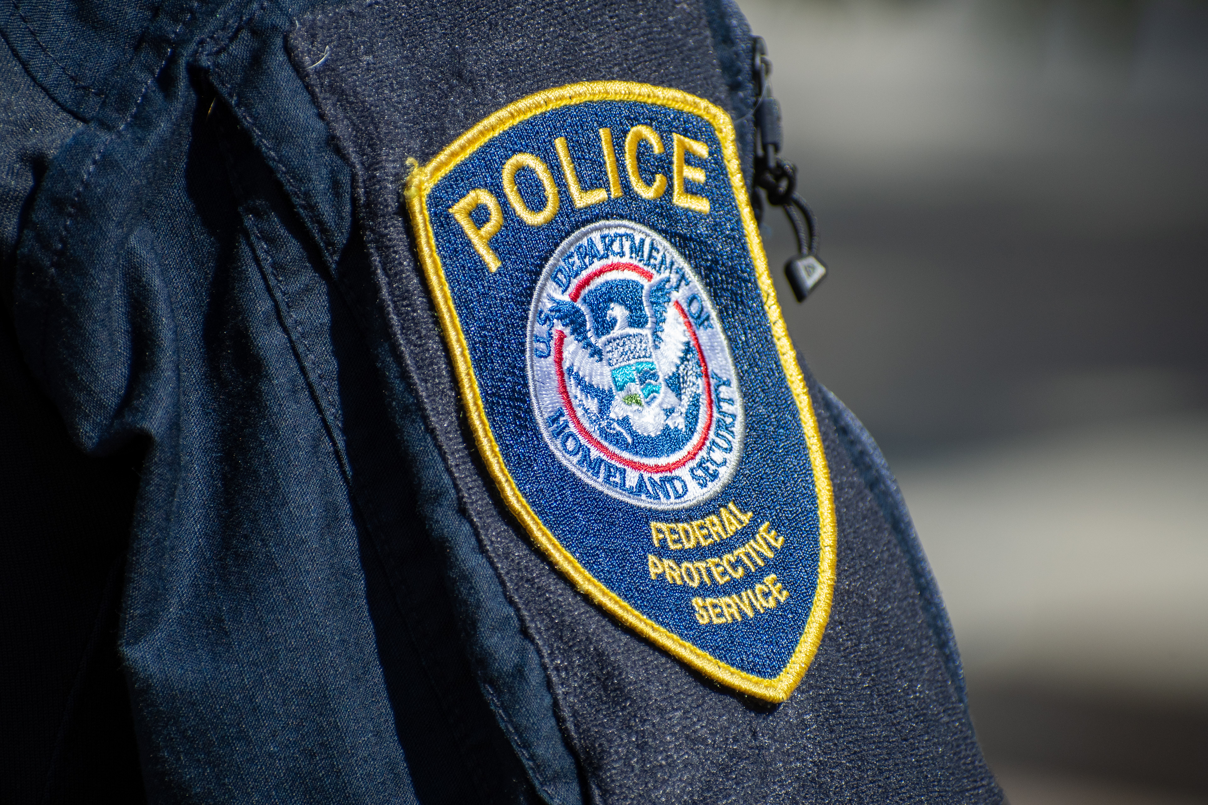 September 15, 2025 – Provo, Utah, United States: A patch reading “POLICE – DEPARTMENT OF HOMELAND SECURITY – FEDERAL PROTECTIVE SERVICE” is seen on the uniform of a Homeland Security police officer during a Department of Homeland Security career expo at the Utah Valley Convention Center. Photograph by Charles‑McClintock Wilson / ZUMA Press Wire