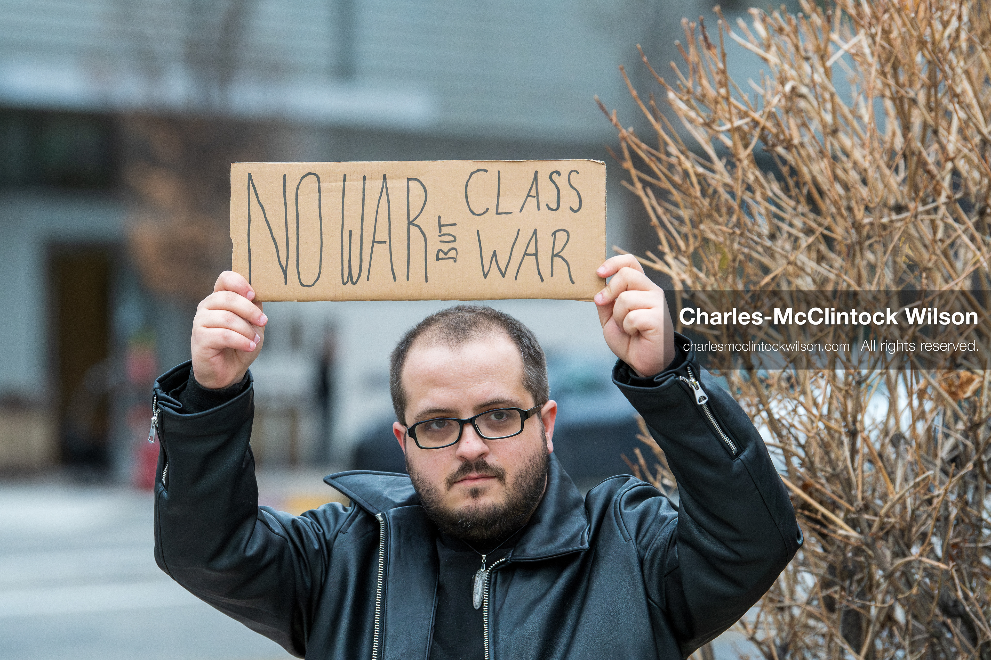 January 3, 2026, Salt Lake City, Utah, USA: A protester holds a sign during a demonstration against US action in Venezuela outside the Wallace Federal Building in Salt Lake City, Utah. The protest was part of a nationwide mobilization responding to recent military developments. (Credit Image: (c) Charles‑McClintock Wilson/ZUMA Press Wire)