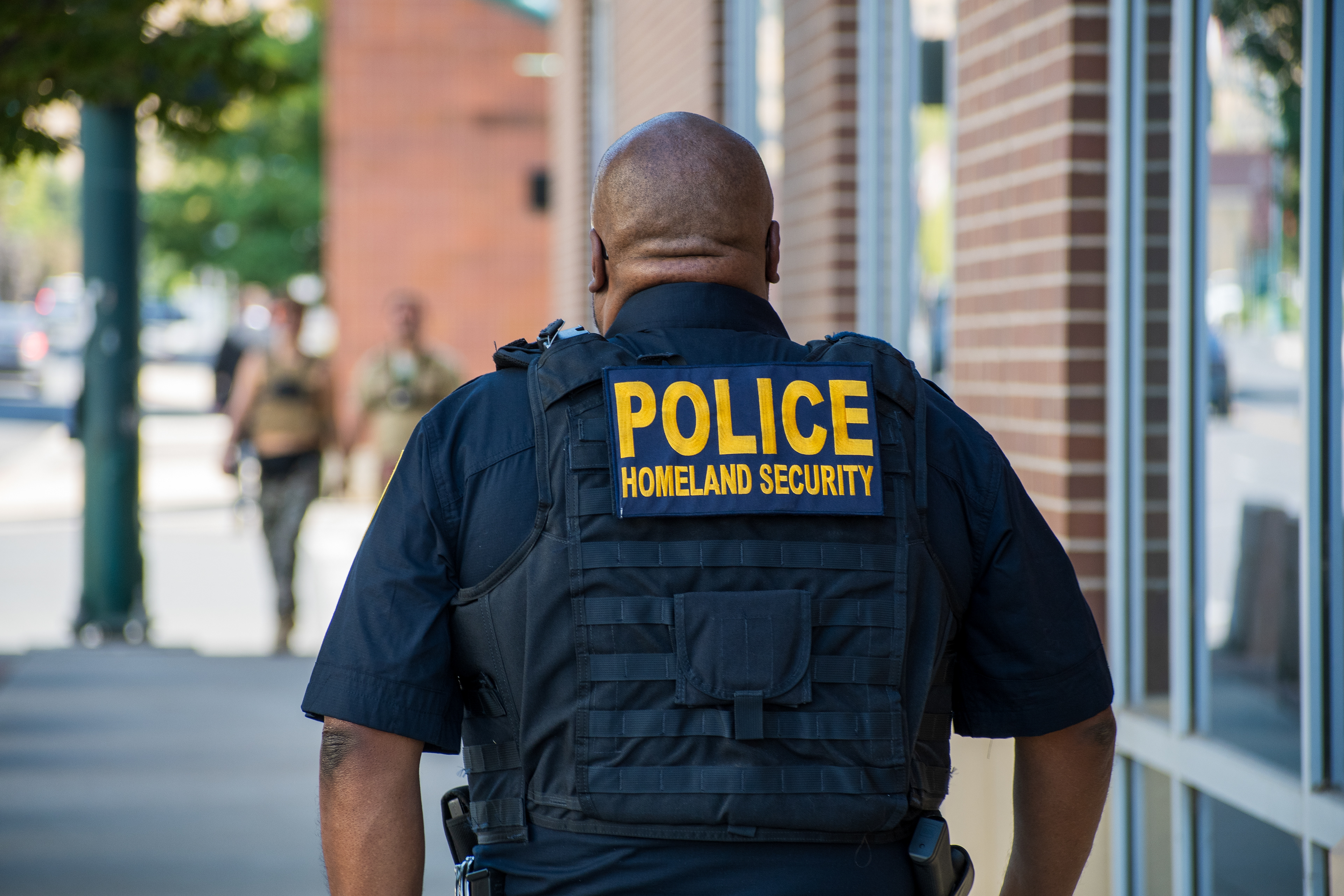 September 15, 2025 – Provo, Utah, United States: A Homeland Security police officer walks near the Utah Valley Convention Center during a Department of Homeland Security career expo focused on recruiting law enforcement and security personnel. Photograph by Charles‑McClintock Wilson / ZUMA Press Wire