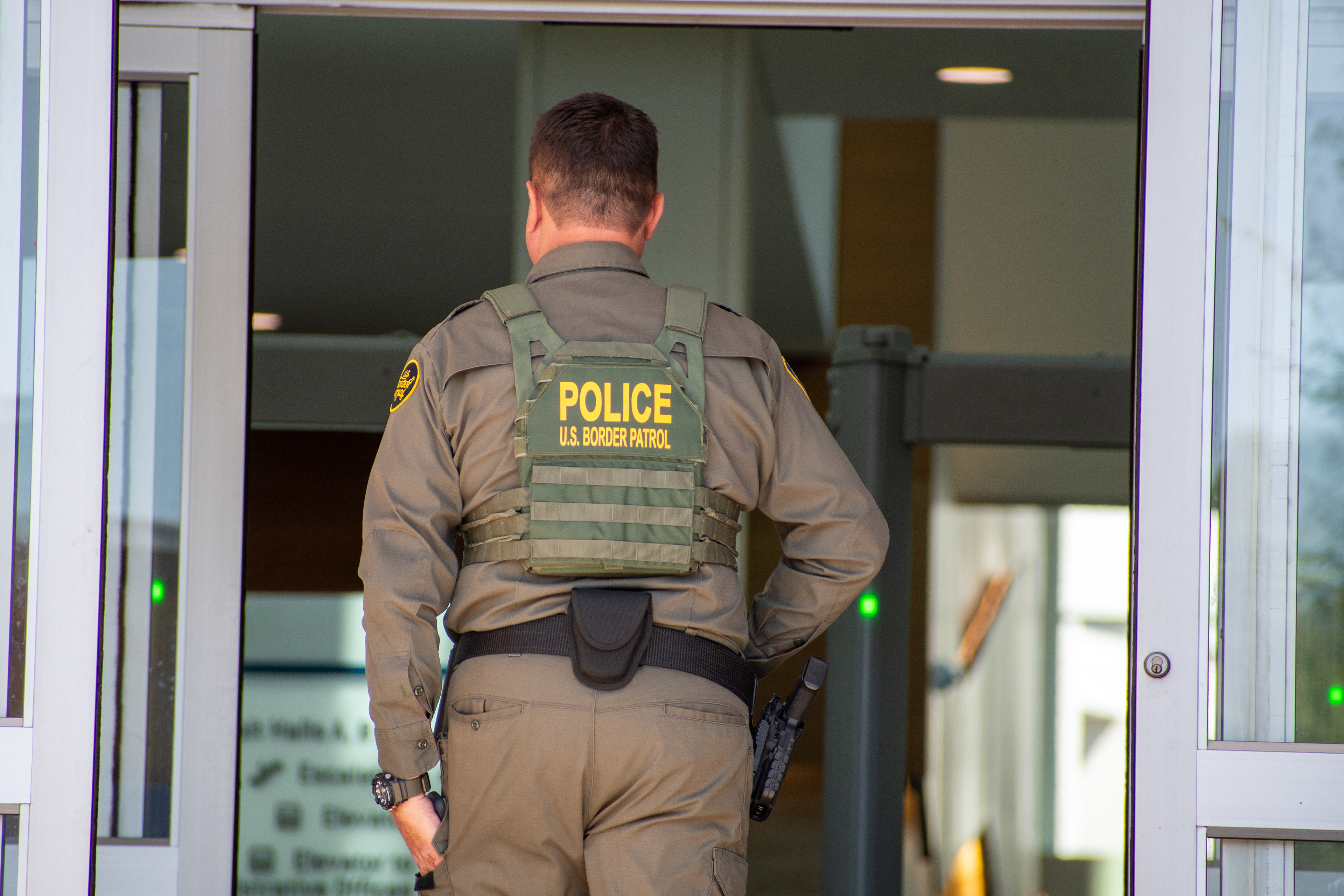 September 15, 2025 – Provo, Utah, United States: A U.S. Border Patrol agent enters the Utah Valley Convention Center during a Department of Homeland Security career expo focused on recruiting law enforcement and security personnel. Photograph by Charles‑McClintock Wilson / ZUMA Press Wire