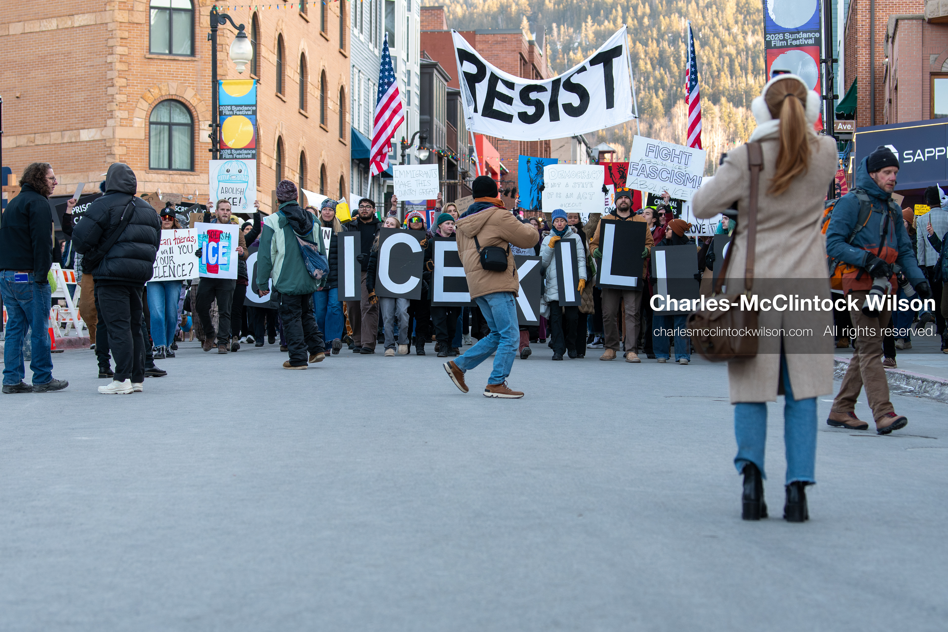 January 26, 2026, Park City, Utah, USA: Demonstrators march through Main Street holding signs during a protest opposing U.S. Immigration and Customs Enforcement (I.C.E.) ICE agents at the Sundance Film Festival in Park City, Utah, on Monday, Jan. 26, 2026. The event was held in response to the fatal shooting of Alex Pretti by a U.S. Border Patrol officer in Minneapolis. (Credit Image: © Charles McClintock Wilson/ZUMA Press Wire)