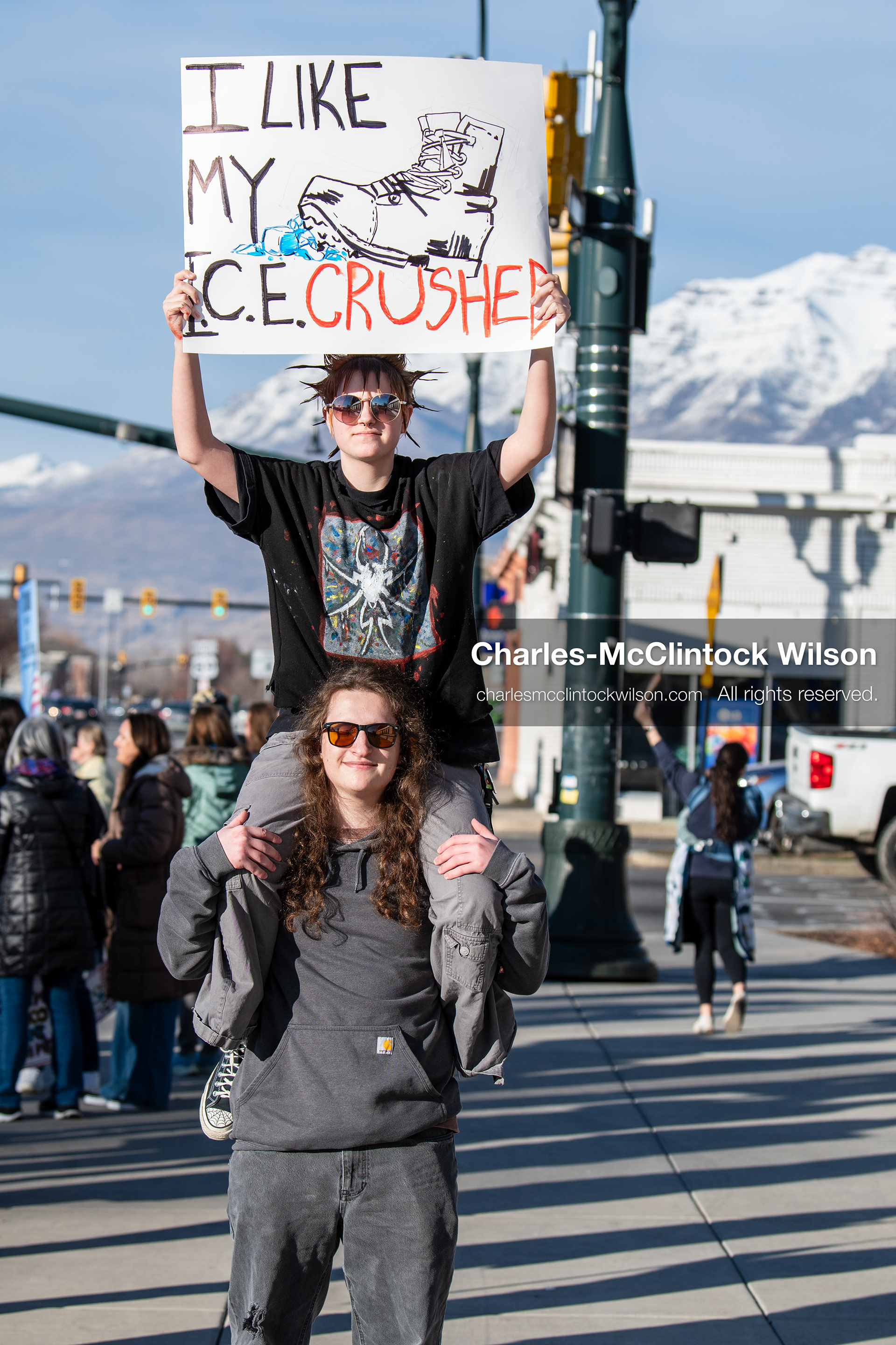 January 20, 2026, Provo, Utah, USA: A demonstrator stands outside Provo City Hall during the Free America Walkout protest in Provo Utah on January 20 2026. The nationwide event called for immigration reform and changes to detention practices. 