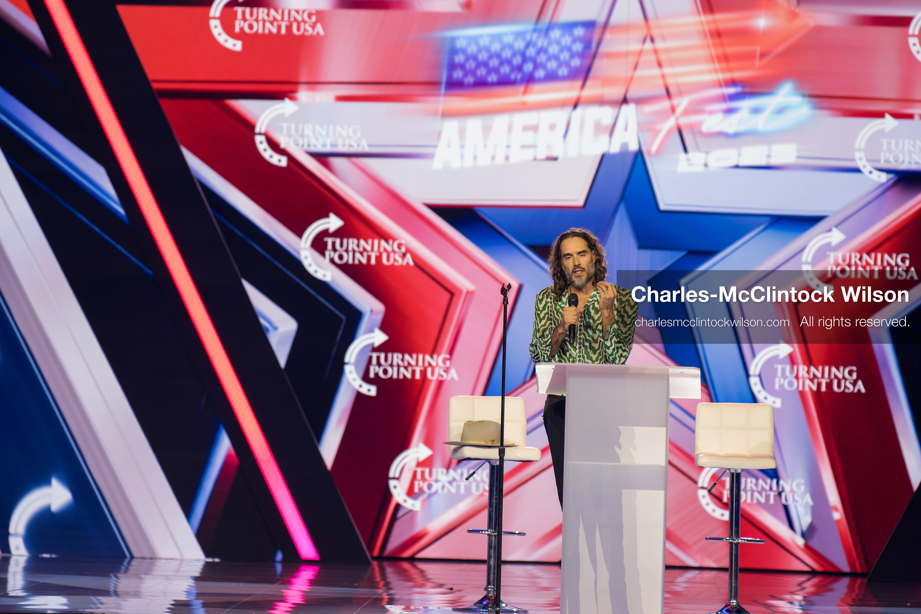 December 18, 2025, Phoenix, Arizona, USA: Russell Brand speaks during Day One of Turning Point USA’s AmericaFest 2025 at the Phoenix Convention Center in Phoenix, Arizona.   (Credit Image: © Charles‑McClintock Wilson/ZUMA Press Wire)