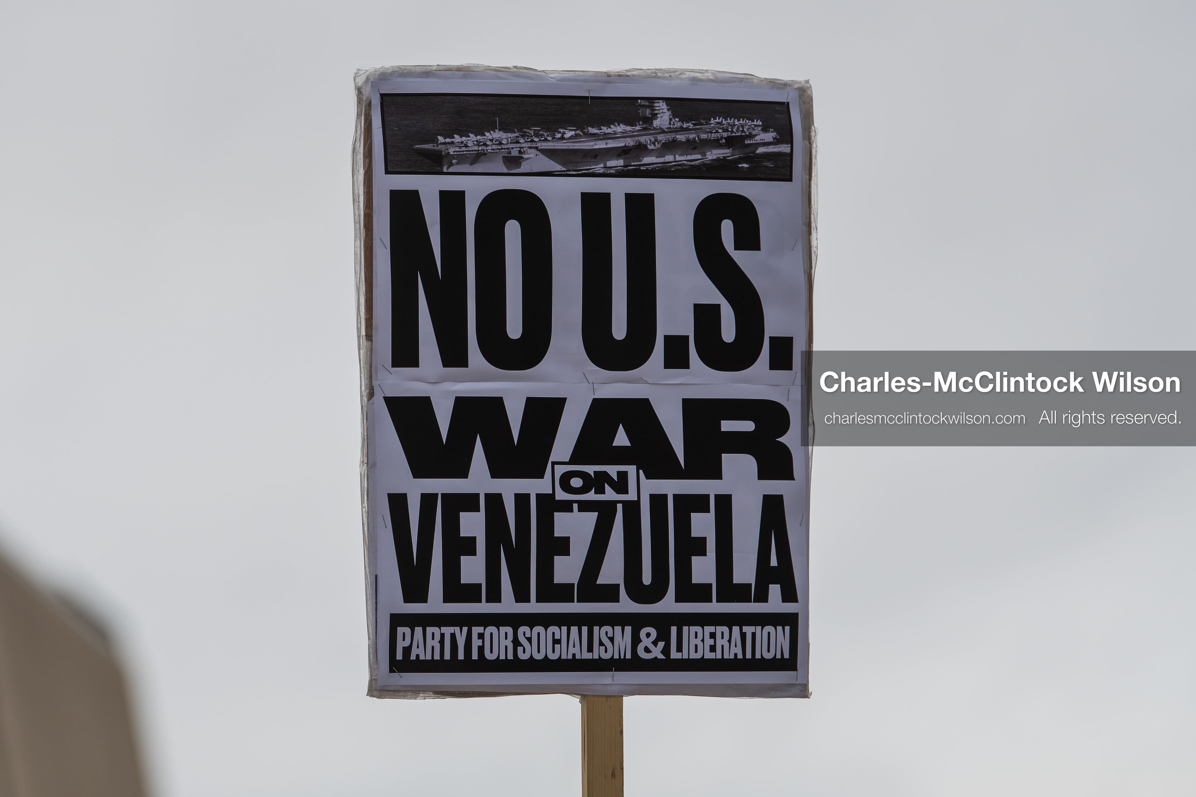 January 3, 2026, Salt Lake City, Utah, USA: A protester holds a sign during a demonstration against US action in Venezuela outside the Wallace Federal Building in Salt Lake City, Utah. The protest was part of a nationwide mobilization responding to recent military developments. (Credit Image: (c) Charles‑McClintock Wilson/ZUMA Press Wire)