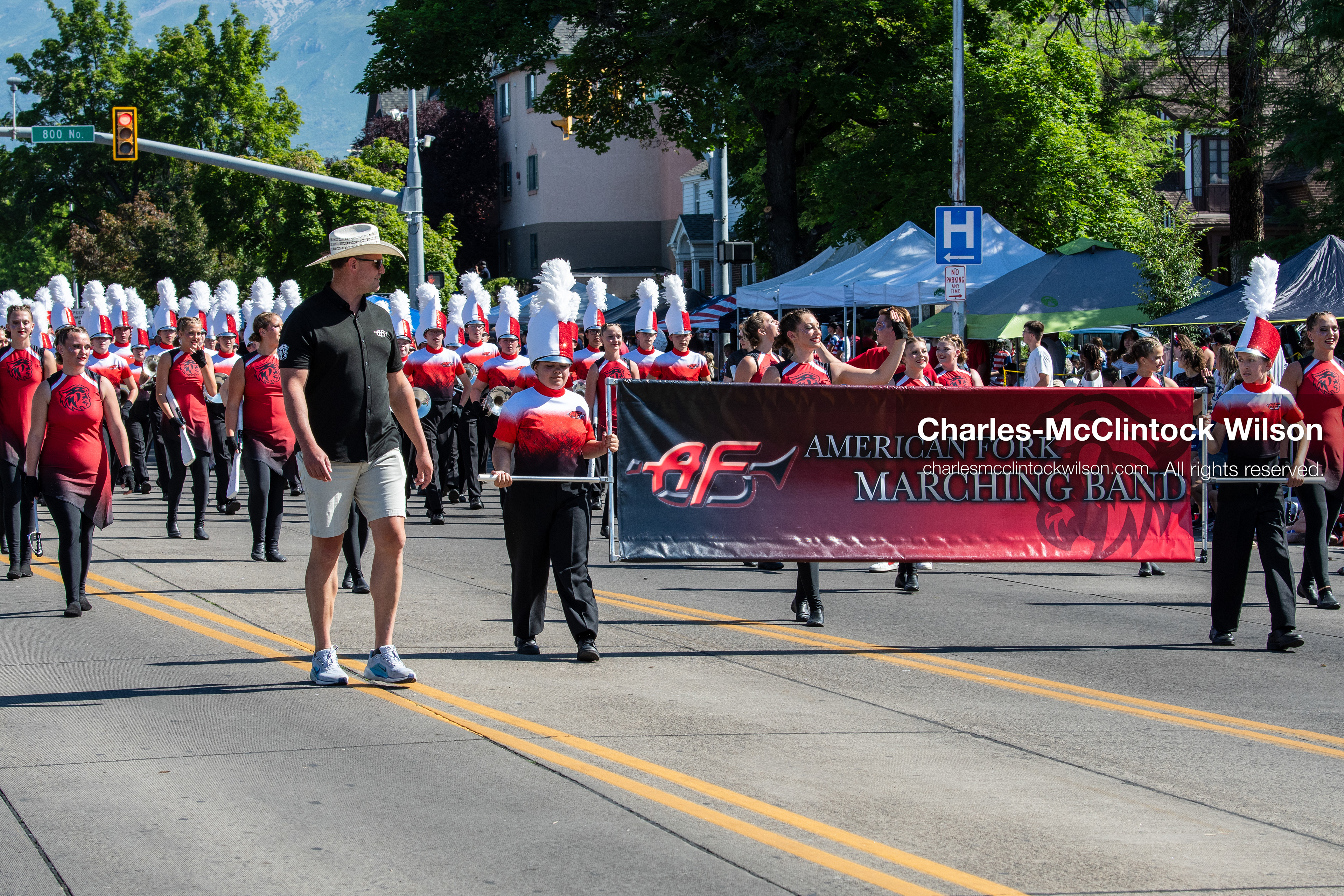 July 4, 2026, Provo, Utah, USA: Members of a high school marching band dressed in maroon and black uniforms play brass instruments while marching down the street during America's Freedom Festival Grand Parade in Provo, Utah, Saturday, July 4, 2026. The annual Independence Day event features expanded programming to honor the 250th anniversary of United States independence. (Credit Image: © Charles-McClintock Wilson/ZUMA Press Wire)