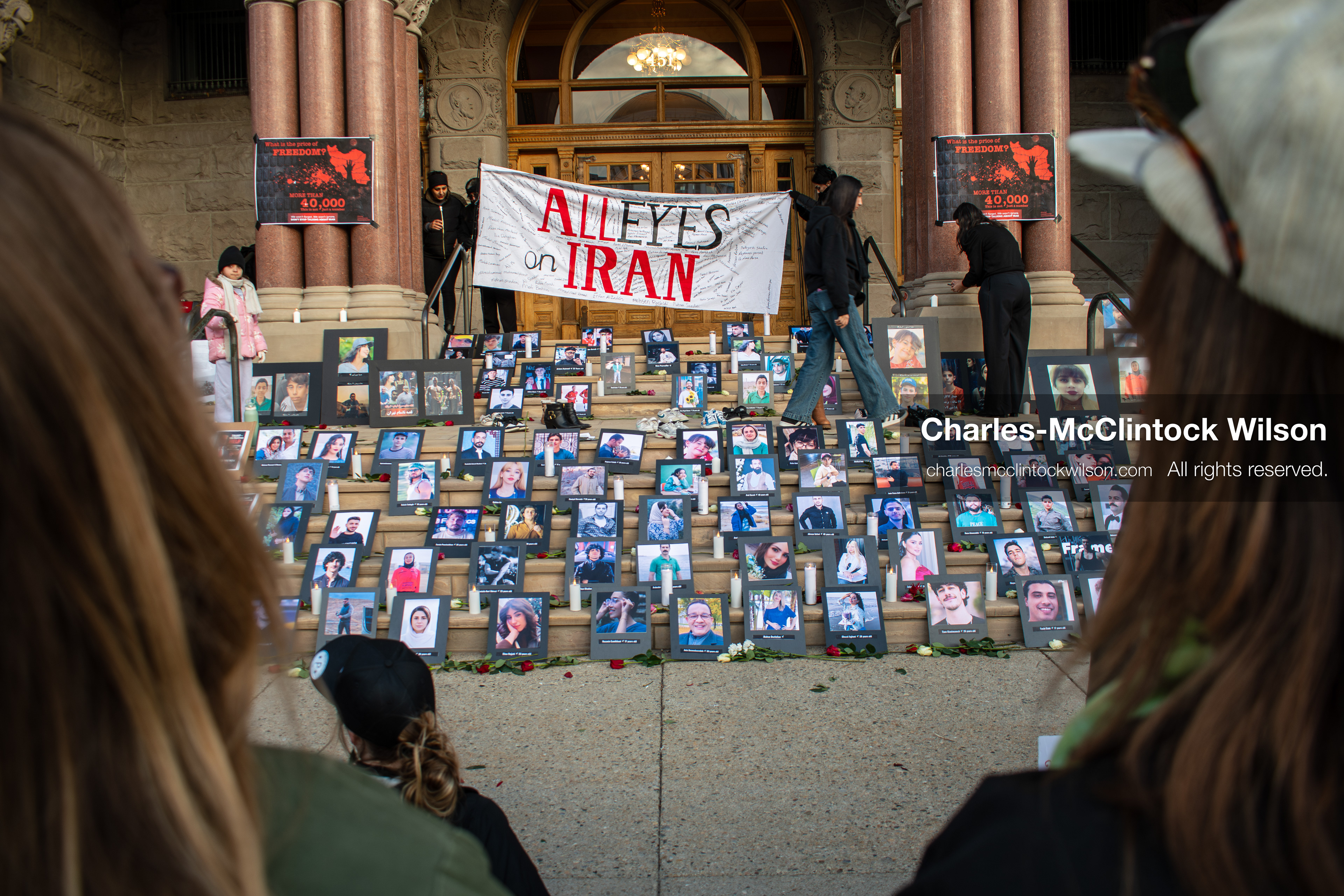 January 30, 2026, Salt Lake City, Utah, USA: Portraits, candles, and flowers are arranged on the steps of the Salt Lake City and County Building during a vigil honoring victims of the Iranian government. (Credit Image: © Charles McClintock Wilson/ZUMA Press Wire)