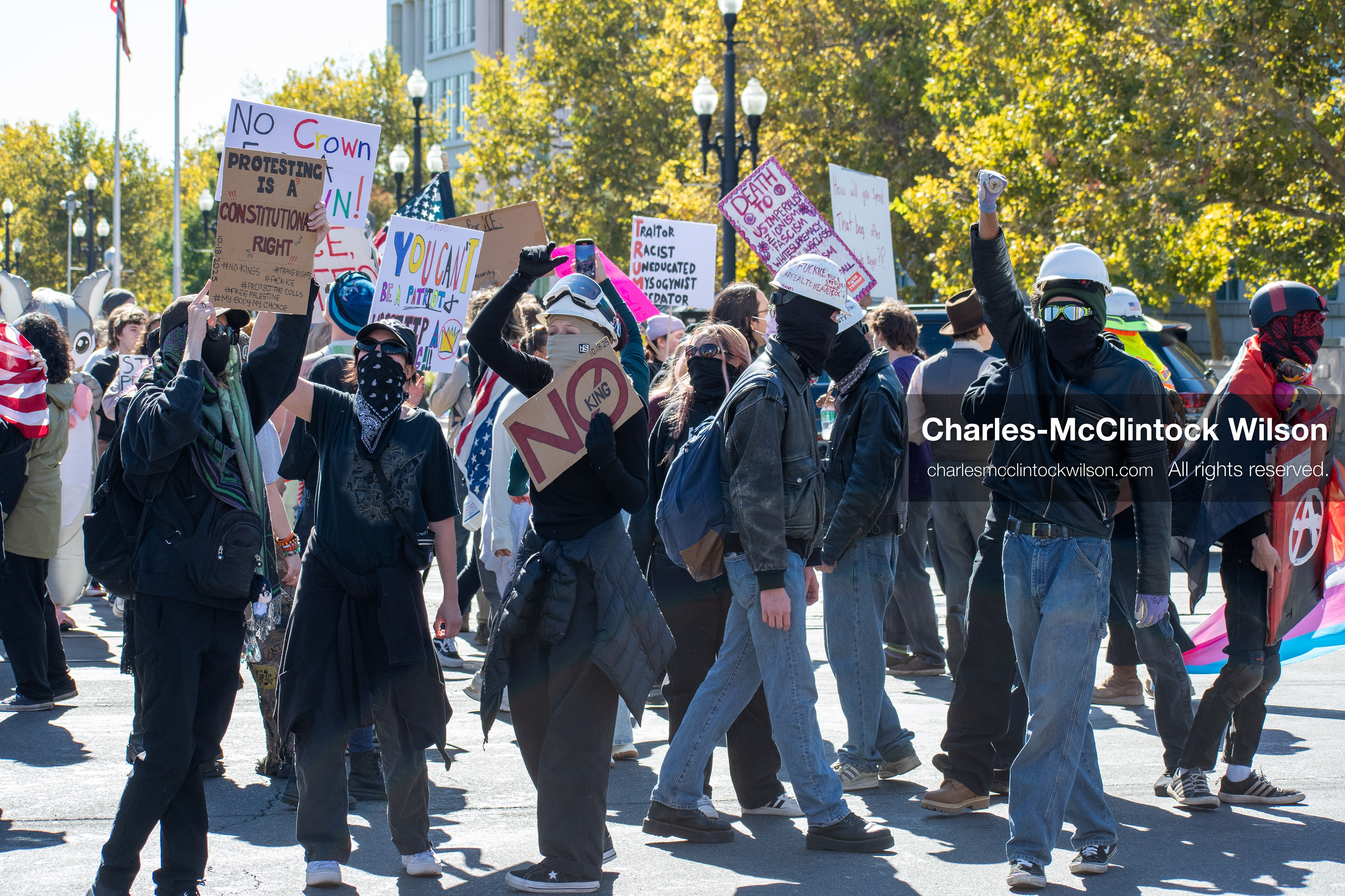 October 18, 2025, Salt Lake City, Utah, USA: Demonstrators march along South State Street during a "No Kings" protest in Salt Lake City, Utah. The protest was part of a nationwide mobilization.