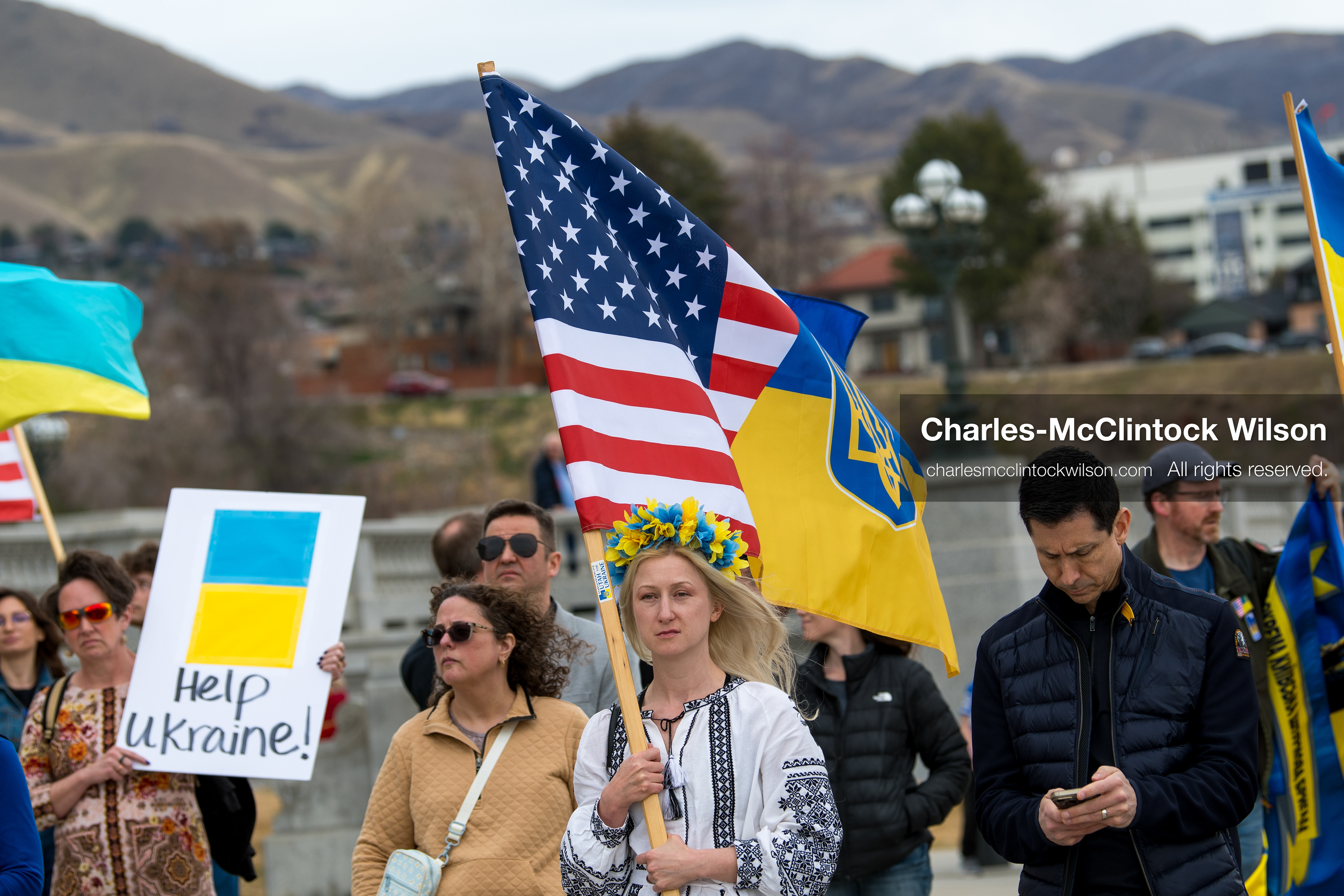 February 28, 2026, Salt Lake City, Utah, USA: A woman wearing a traditional Ukrainian embroidered blouse and a blue and yellow flower wreath holds a Ukrainian flag during the Stand With Ukraine rally near the Utah State Capitol. The gathering marked the four year anniversary of the full scale Russian invasion of Ukraine and brought community members together in support of Ukrainians and local humanitarian efforts. (Credit Image: © Charles McClintock Wilson/ZUMA Press Wire)