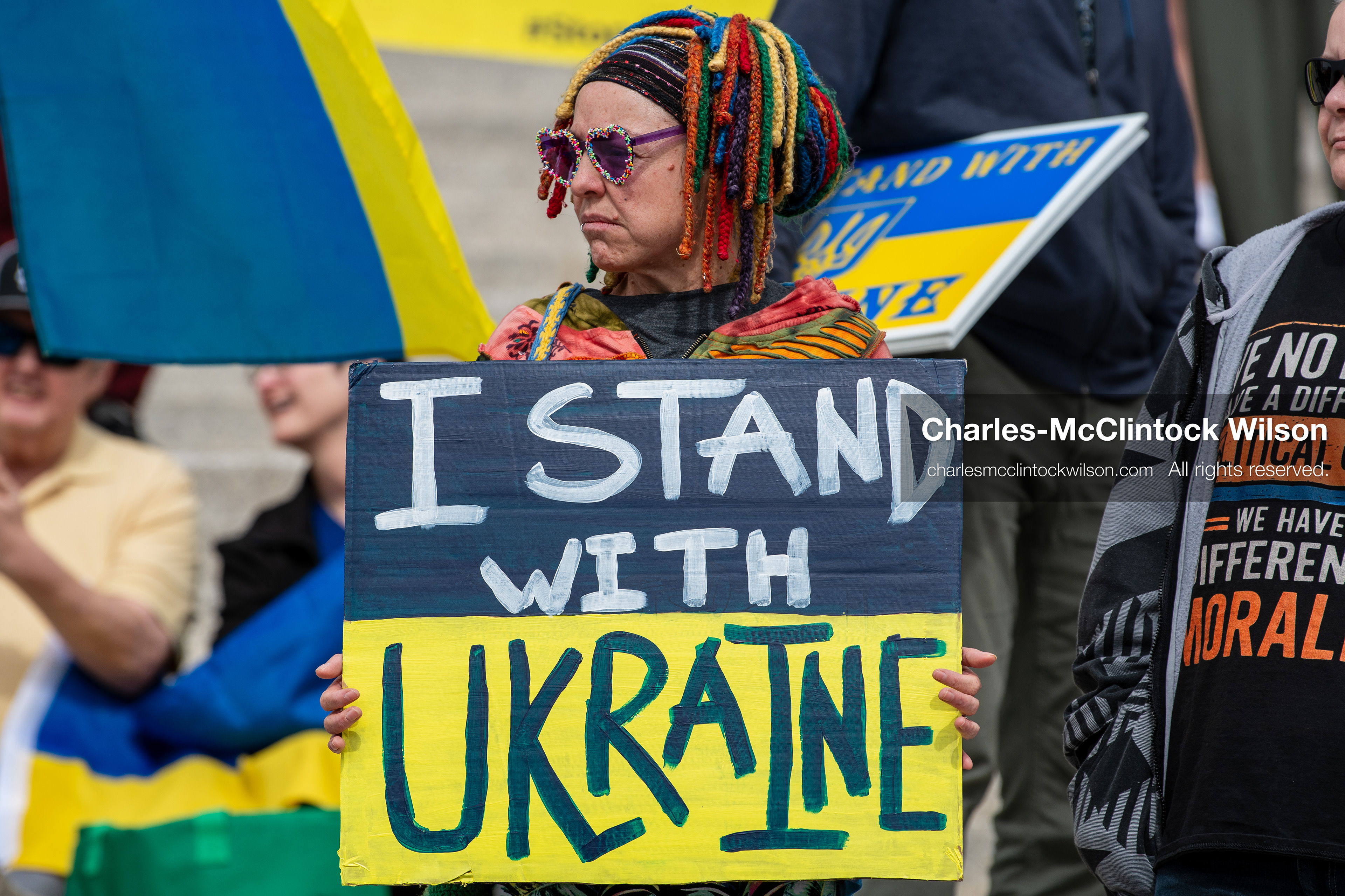 February 28, 2026, Salt Lake City, Utah, USA: A demonstrator holds a sign reading I Stand With Ukraine on the steps of the Utah State Capitol during the Stand With Ukraine rally. The gathering marked the four year anniversary of the full scale Russian invasion of Ukraine and brought community members together in support of Ukrainians and local humanitarian efforts. (Credit Image: © Charles McClintock Wilson/ZUMA Press Wire)