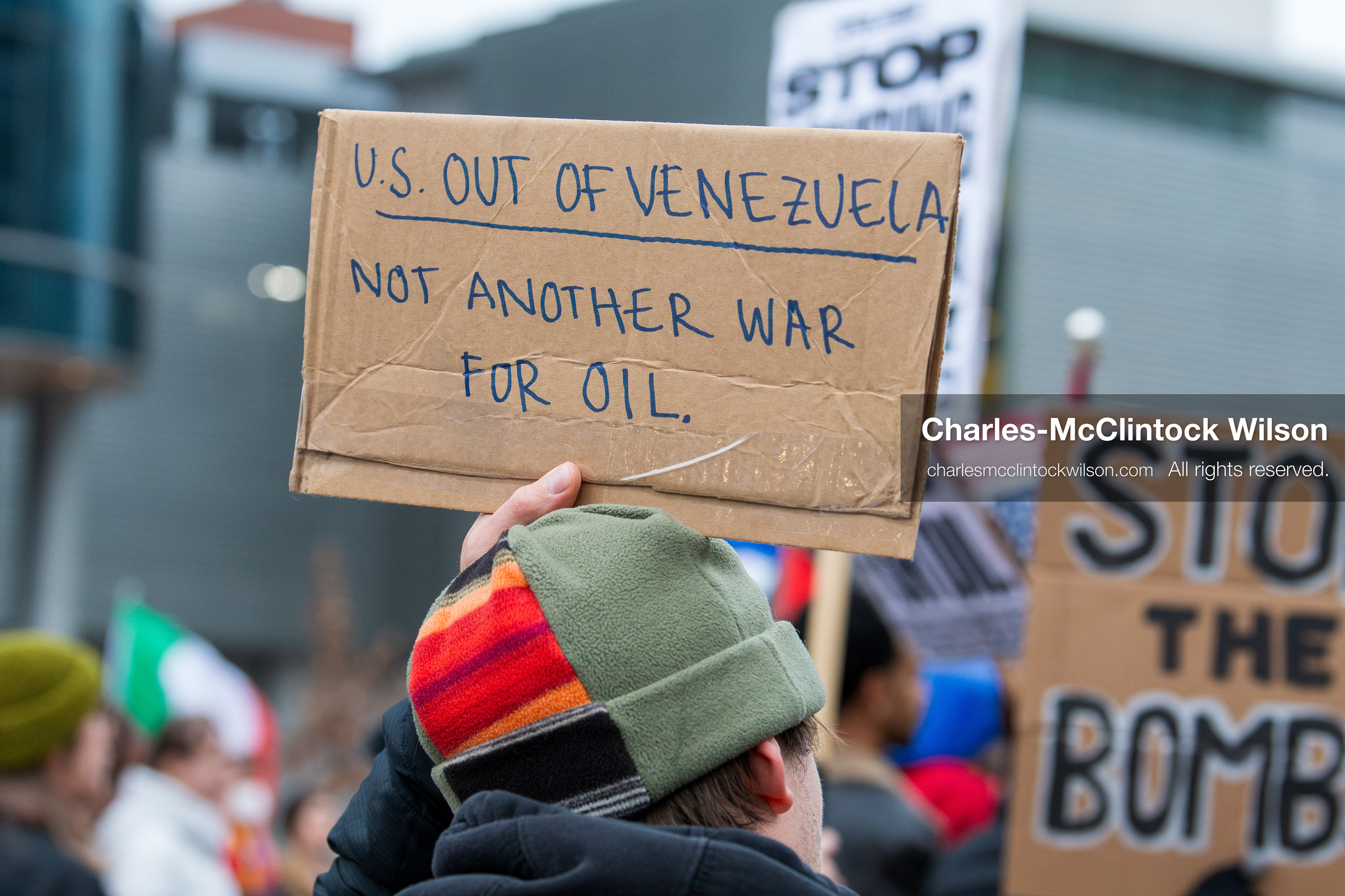 January 3, 2026, Salt Lake City, Utah, USA: A protester holds a sign during a demonstration against US action in Venezuela outside the Wallace Federal Building in Salt Lake City, Utah. The protest was part of a nationwide mobilization responding to recent military developments. (Credit Image: (c) Charles‑McClintock Wilson/ZUMA Press Wire)