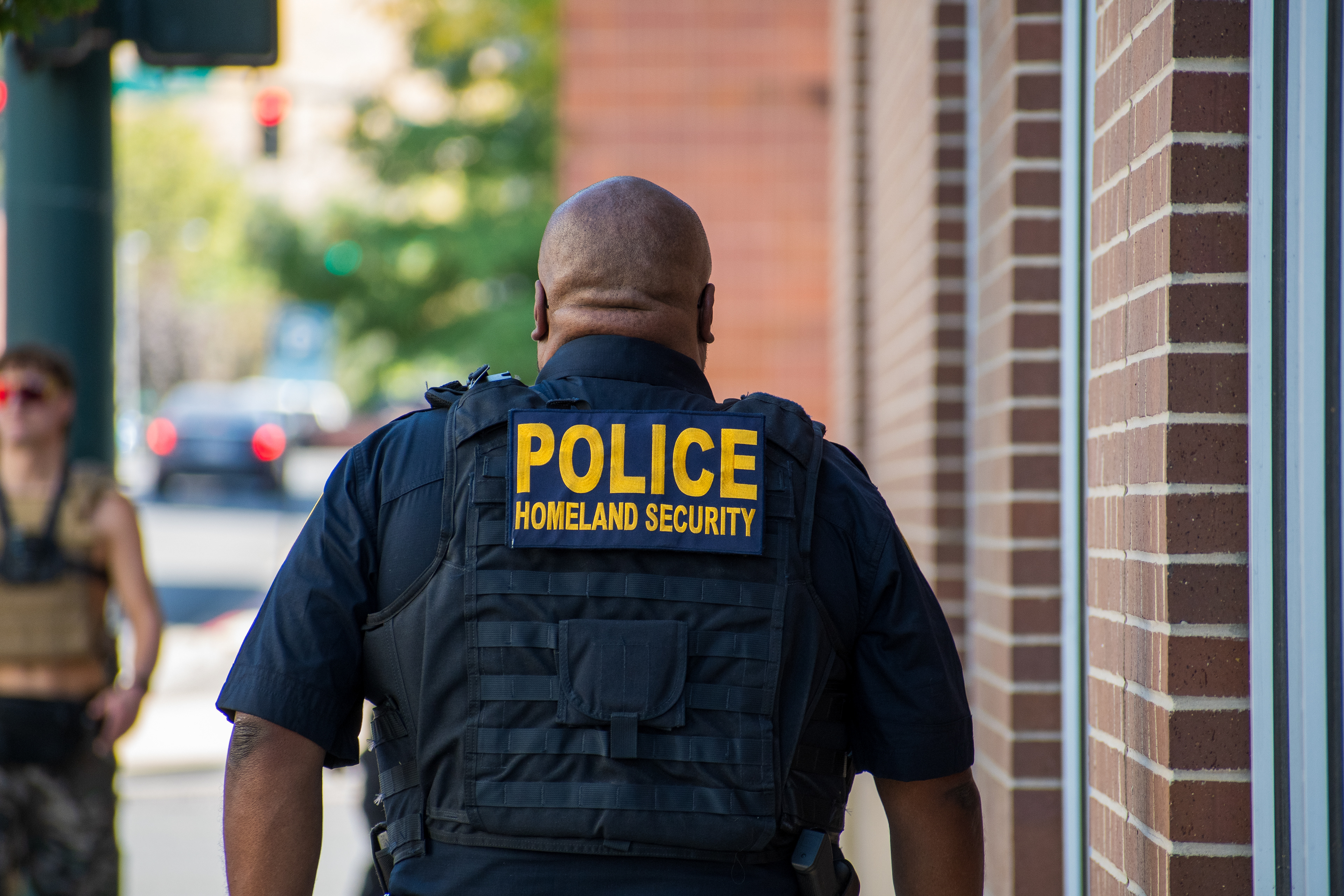 September 15, 2025 – Provo, Utah, United States: A Homeland Security police officer walks near the Utah Valley Convention Center during a Department of Homeland Security career expo focused on recruiting law enforcement and security personnel. Photograph by Charles‑McClintock Wilson / ZUMA Press Wire
