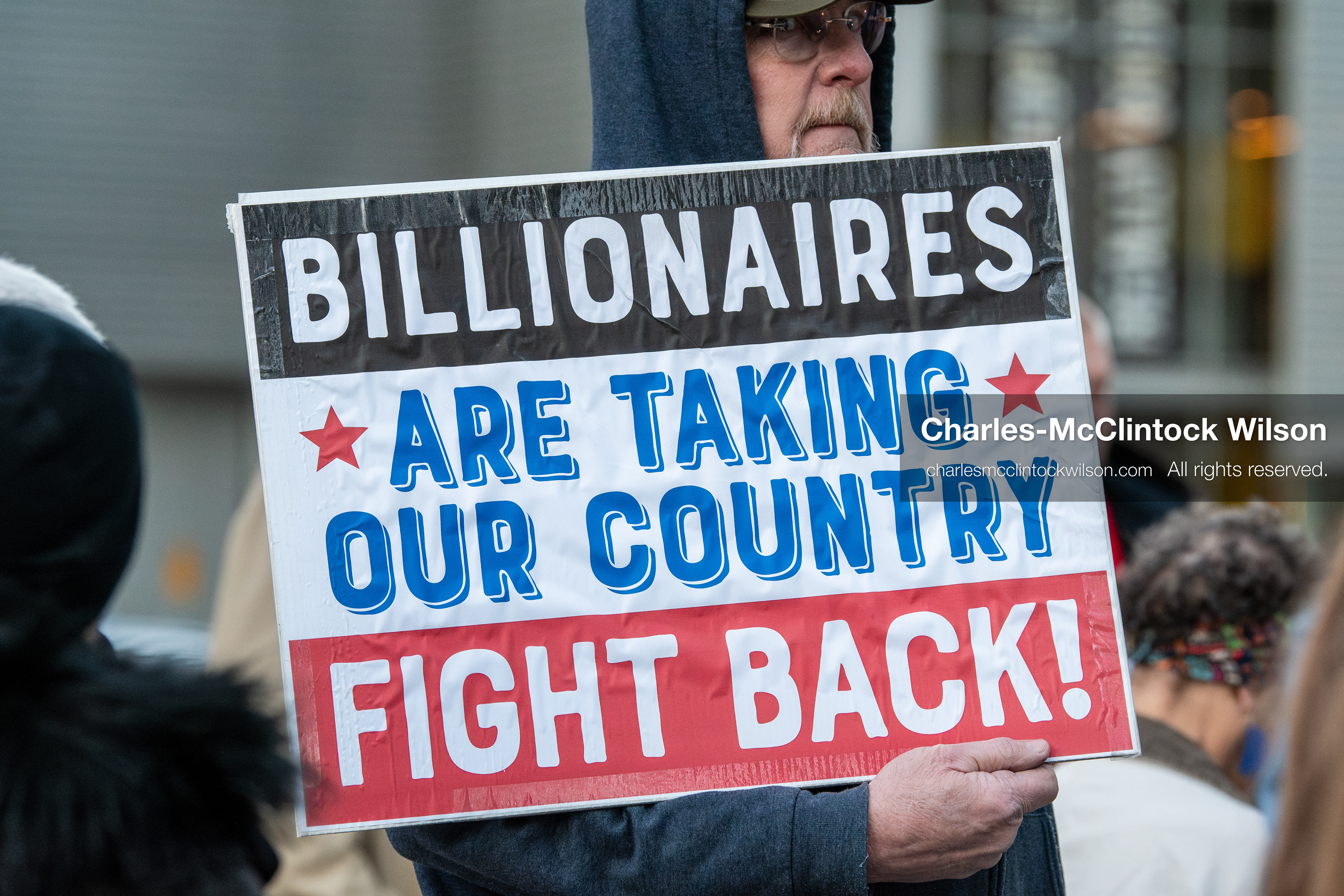 January 5, 2026, Salt Lake City, Utah, USA: A demonstrator holds a sign during a protest outside the Wallace Federal Building in Salt Lake City, Utah. The rally, organized by Salt Lake Indivisible, called for congressional limits on presidential war powers following recent US military actions in Venezuela involving the government of Nicolas Maduro. (Credit Image: (c) Charles‑McClintock Wilson/ZUMA Press Wire)