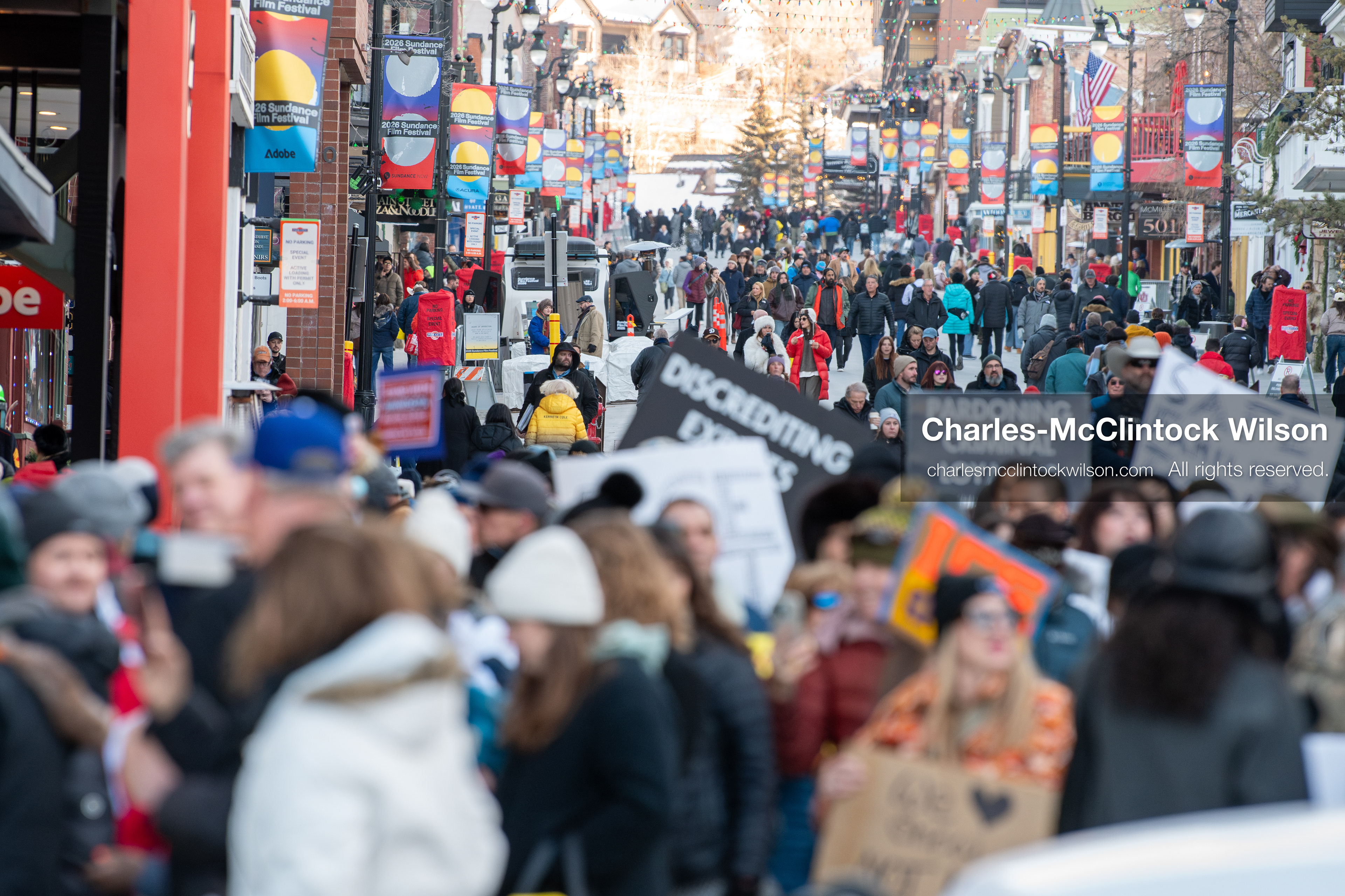 January 26, 2026, Park City, Utah, USA: Demonstrators march through Main Street holding signs during a protest opposing U.S. Immigration and Customs Enforcement (I.C.E.) ICE agents at the Sundance Film Festival in Park City, Utah, on Monday, Jan. 26, 2026. The event was held in response to the fatal shooting of Alex Pretti by a U.S. Border Patrol officer in Minneapolis. (Credit Image: © Charles McClintock Wilson/ZUMA Press Wire)