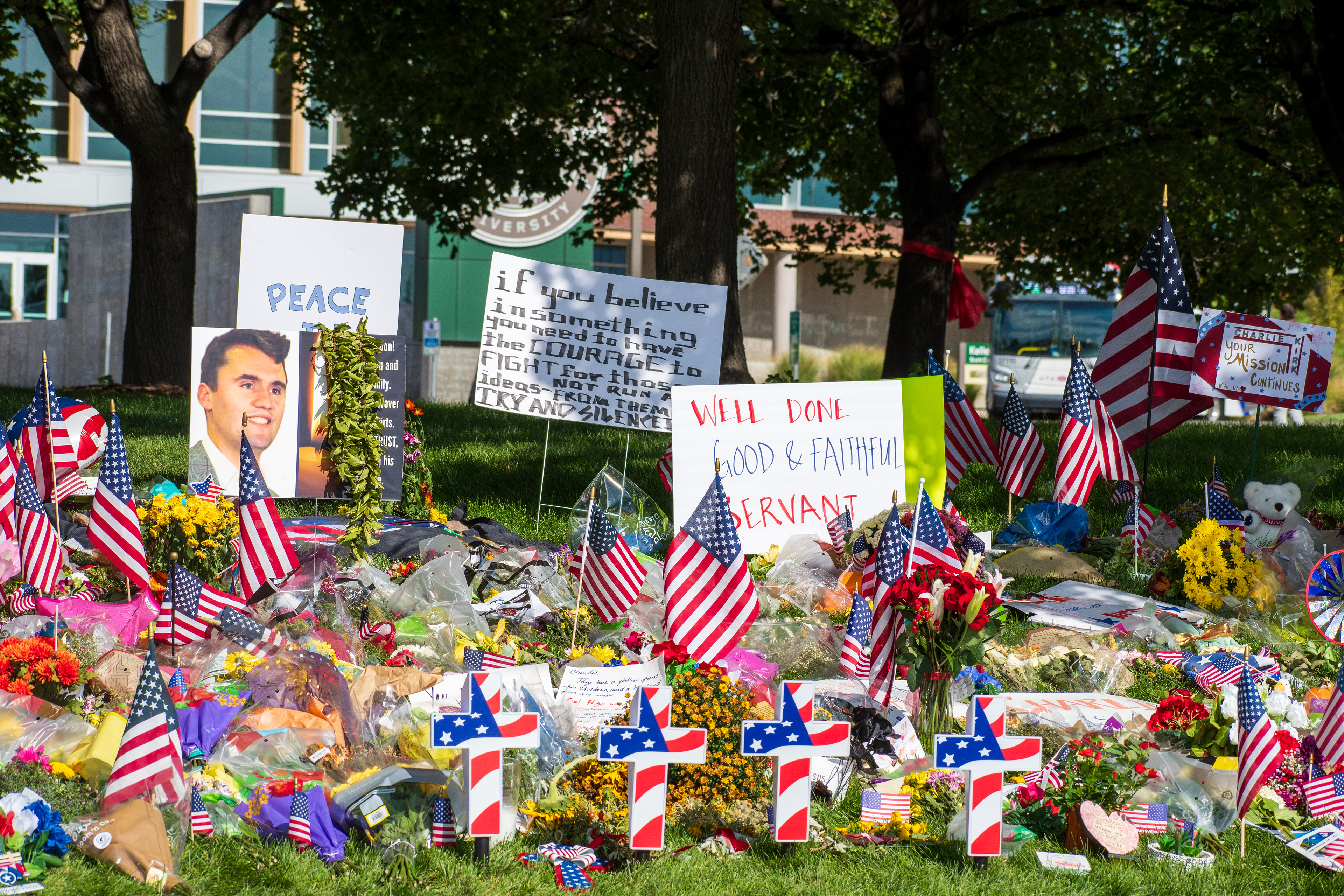OREM, UTAH – SEPTEMBER 15, 2025: A memorial honoring Charlie Kirk is seen on the campus of Utah Valley University, featuring American flags, candles, flowers, and handwritten signs arranged around a large portrait. The tribute appeared days after Kirk’s final public event at the university. © Charles‑McClintock Wilson / ZUMA Press